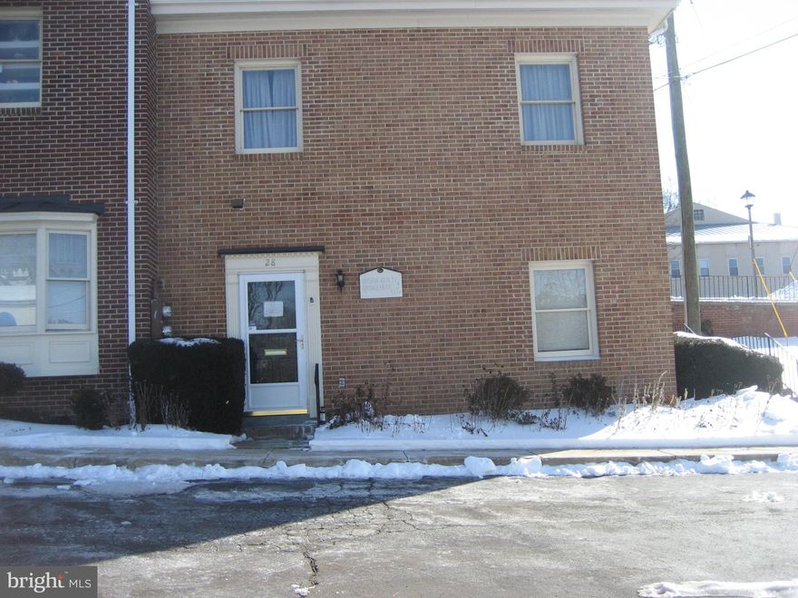 Great location for your office off of Waterloo Street in historic Warrenton within close proximity to Main Street or Fauquier County Offices and other retail and offices in Town.  You can have signage on the building by your door and can have your name on the building directory seen from Waterloo Street.  HOA is very proactive especially when there is snow to have the sidewalks cleared and parking lot cleared. Floorplan will allow you to have a receptionist area and two large offices or you can open it by removing the one division wall to have one large L shaped space depending on your specific needs. One area has built in book shelves for display.  Small kitchnette and half bath.  Great location as unit has direct access within a few steps from parking lot with allowance for two vehicle parking spaces per condo unit designated by HOA.  Do not need to move your car every two hours on John Marshall Street to avoid a parking ticket or park in town parking lots. Well natural lighted office with multiple windows, three of which are protected by bars for security and privacy.  Many county offices located as neighboring properties.  Prior usages of condo  include real estate office, lawyer office, seamstress and other condo units are various offices or professional services to include hairdresser, construction office, marketing office, etc.