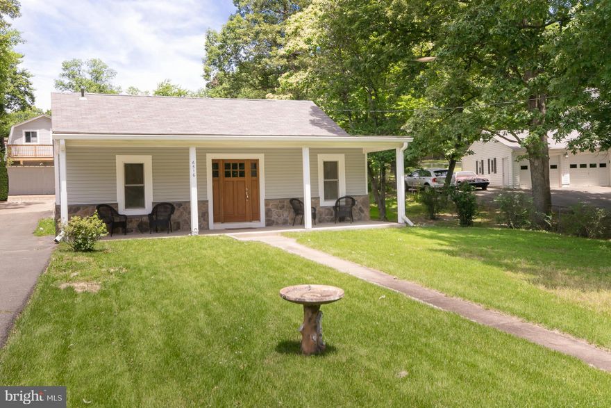 Completely remodeled down to the stud with an addition!   Charming bungalow situated on over a 1/2 acre lot!  Just a few minutes to Springfield Metro and Town Center!  Close to major commuting routes without noise or thru traffic!  Two level garage structure having a separate studio.  New plumbing, electrical, high ceilings beautiful kitchen cabinets with stainless appliances and granite counters