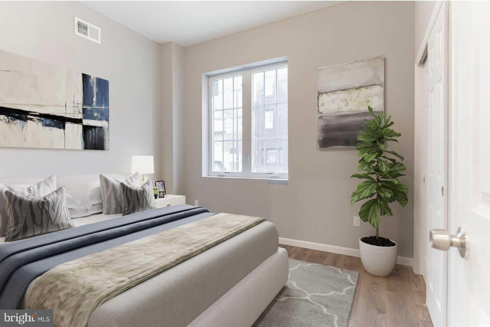 Live at 2323 N 2nd St #2 — a recently renovated 2-bedroom, 1-bathroom apartment offering a bright and open layout. Large windows fill the space with natural light, complementing details like exposed brick, recessed lighting, and a peninsula kitchen with seating.
The kitchen is equipped with modern appliances, including a refrigerator, stove, microwave, and dishwasher, while the in-unit washer and dryer add everyday convenience. Both bedrooms feature oversized closets, and central heating and cooling ensure year-round comfort.