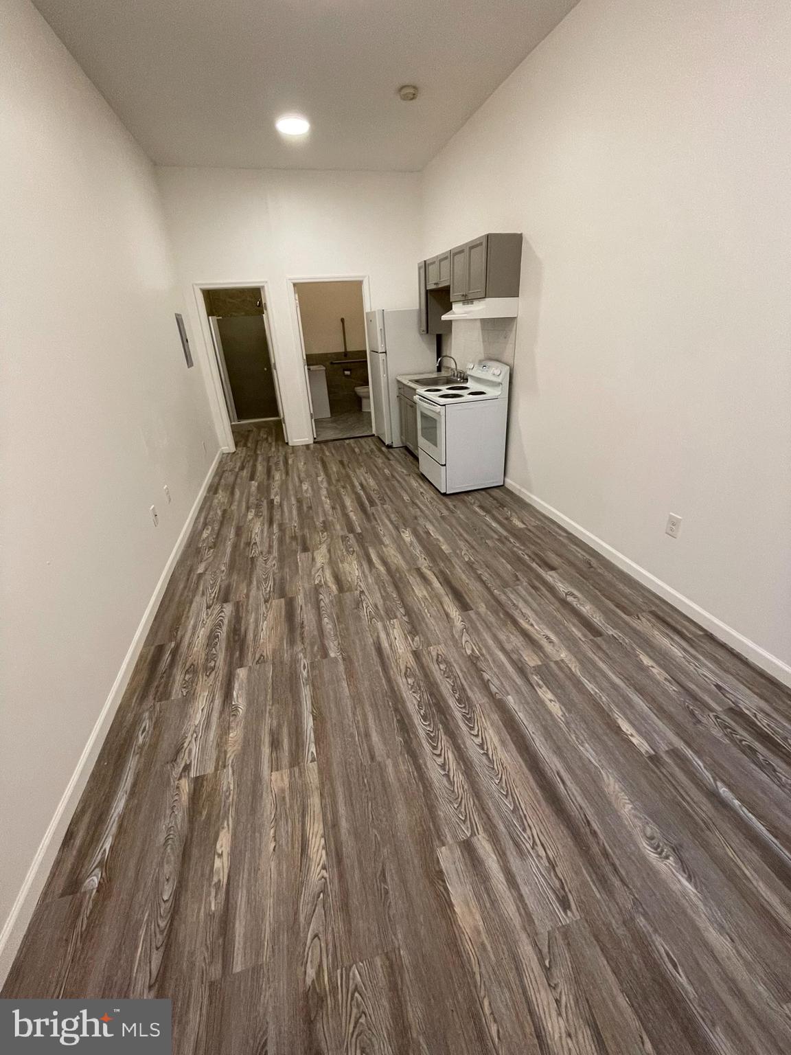 Newly Renovated- Efficiency - Like new appliances, refrigerator included. Wheelchair accessible, bus stop on corner. Water included. Apartment qualifies for Section 8 and most veteran programs. Tenant pays electric.