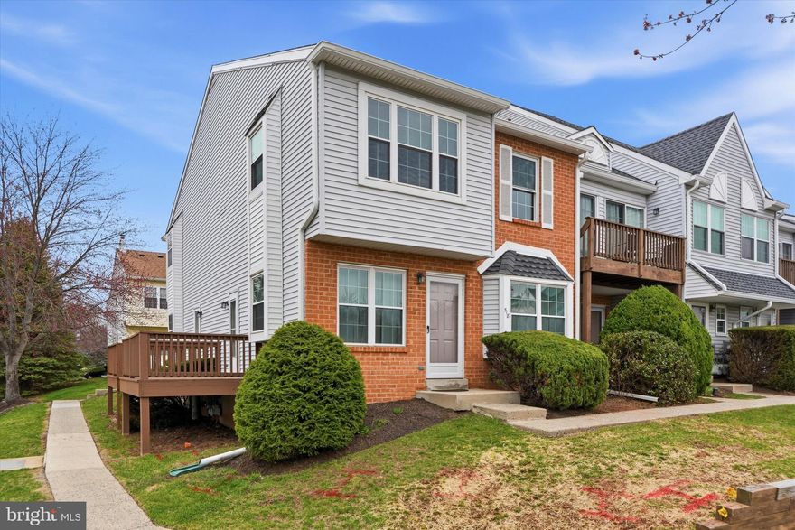 Beautifully updated corner unit offering bright, open living space and stylish modern finishes throughout.
The sun-filled main level features a spacious open floor plan with wide plank flooring, updated fixtures, and an attractive kitchen with white cabinetry, granite countertops, stainless steel appliances, tile backsplash, and breakfast bar seating. A convenient powder room and rear deck access make the main level perfect for everyday living and entertaining.

Upstairs you’ll find two generously sized bedrooms with great natural light, ceiling fans, and ample closet space, along with a fully renovated full bathroom featuring a modern vanity, updated lighting, and custom tile tub surround.

The finished basement provides excellent additional living space ideal for a family room, home office, or gym, plus a separate laundry and storage area.

Enjoy the benefits of this desirable corner location with added privacy and outdoor deck space, along with community amenities including a pool and playground.
Move-in ready and tastefully updated throughout.