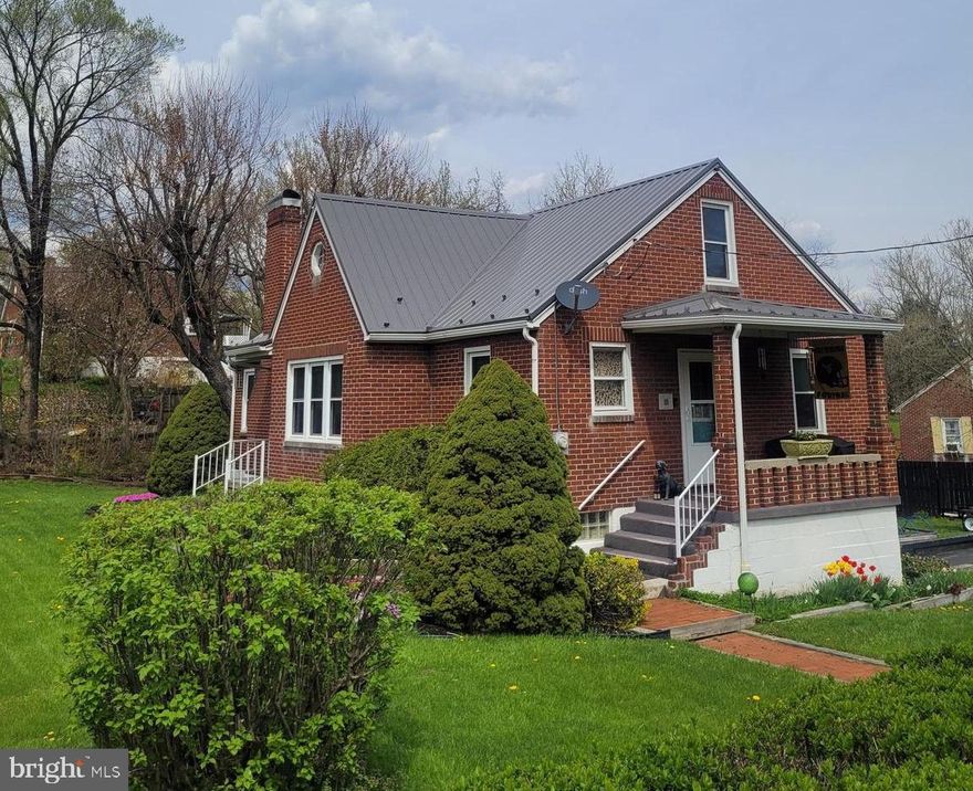 Looking for single level living? How about the most charming brick home to settle into? Perfect for starting out or settling down this home has it all and turn key ready!  The kitchen boasts Ravenscroft soft-close cabinets, stunning quartz countertops, stone backsplash and beautiful tiled floors (remodeled 2015).  You will also find the perfect coffee (or not) bar! Those gleaming floors extend into a separate dining area with plenty of natural light. Once you step into the living area you will notice the newer carpet and a stunning stone fireplace! The custom mantel and gas logs radiate a cozy atmosphere (remodeled 2015). The custom crown molding is the icing on the cake!

There are 1-2 bedrooms on the main floor, both having that newer carpet installed (new  2022). The primary bedroom is light, bright and airy! The other bedroom is a flex room, use it as a small bedroom OR a perfect office space, playroom, etc. This bedroom also has the access to a sizeable deck outside! The quality and craftsmanship continues in the sizeable primary bath. Built-in cabinets, granite countertop, ceramic tile shower and waterproof luxury vinyl plank flooring! The star of the show is the laundry area which is perfect for those seeking that single level lifestyle (bath reno 2019)! Upstairs the attic space is finished and houses a large walk in closet area, luxury plank flooring, and copious amounts of space for the bedroom area or another flex space at your disposable (finished 2017)! No scary basements here! Perfect space to finish if you please. Also you will see there is another full bath, ready to go! Your automatic garage door and space is perfect protection from the elements for your vehicle.  There is also a second laundry area ready to go! 

The outside is just as cared for as the inside. Its easy to notice the impressive metal roof and gutters (new 2020), replacement windows throughout (new 2017), paved driveway and gorgeous landscaping! Those privacy hedges make you feel like you are in your own little world with a spacious yard that is perfect for the upcoming warm weather. Speaking of warmer weather, there is a fully tended strawberry patch!

Worried about utilities? The hot water tank, furnace and central air all replaced in 2021!

This home comes with many items included as well. Like I said TURN KEY! I could gush on and on about this charmer but you just have to see it for yourself. Call today and move in May,  which is perfect time for those strawberries!