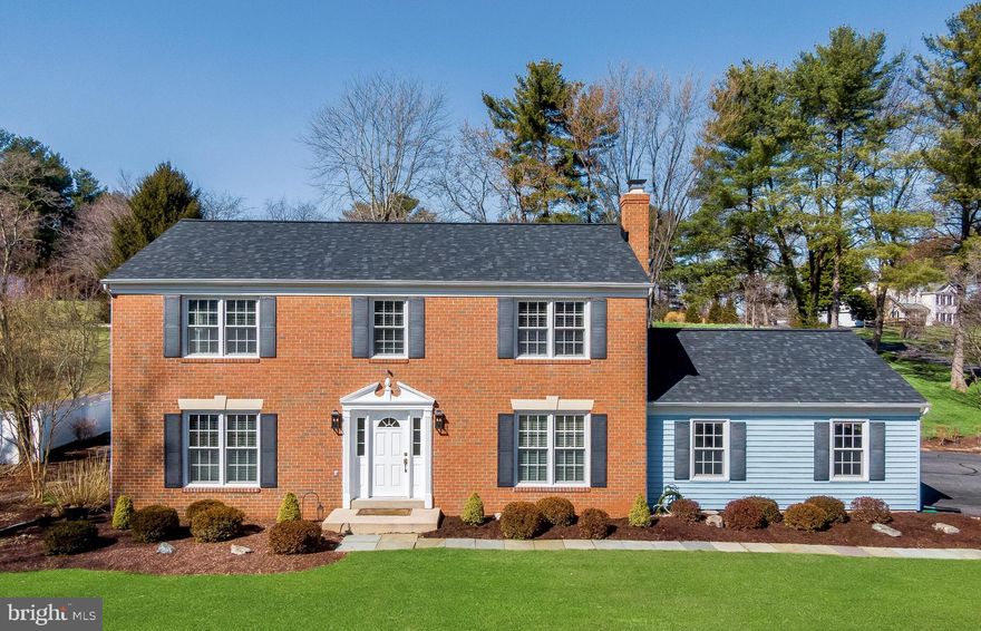 Nestled in the serene community of Rolling Green, this meticulously maintained and charming home offers a perfect blend of comfort and style. With over 3,600 square feet of thoughtfully designed total finished living space, this residence features many updates along with five spacious bedrooms and three and a half bathrooms, ensuring ample room for relaxation and privacy.

Step inside the newly painted home to discover a warm and inviting atmosphere, highlighted by top of the line wood flooring, elegant crown moldings and recessed lighting that enhance the traditional yet open floor plan, ideal for everyday living and entertaining.  Upon entry, the living room, to the left,  is highlighted by pristine corner shelving, custom lighting and moldings/trim. The formal dining room is just beyond, filled with natural light from a large window facing the patio and rear of the property. The kitchen is equipped with stainless steel appliances, granite countertops, and custom high end cabinetry and opens to a bright breakfast area overlooking the garden.  The cozy breakfast area leads to a beautiful outdoor oasis, perfect for enjoying morning coffee while basking in natural light.  The main floor also offers a private laundry room with storage and shelving.

The home also features a spacious main-level suite offering exceptional flexibility. This rare living space can serve as a primary bedroom, in-law or au pair suite, or private guest quarters. It is complete with beautiful custom wall-to-wall built-in shelving, an updated full bathroom, and its own private entrance—making it ideal for extended family, visitors, or a private home office.  The cozy family room, set off the kitchen, offers built-ins and a fireplace which creates a focal point for cozy evenings spent with loved ones.

Upstairs, you’ll find four generously sized bedrooms, all filled with natural light. One secondary large bedroom offers two closets, while the other bedrooms are spacious and provide ample storage. The  primary suite features natural light, a walk-in closet, and a private full bath.
The fully finished basement features new LVP flooring, and recess lights.  It also provides additional living space and windows that provide natural light.  The lower level is ideal for a home theater, playroom, or personal gym. . Walk-in closets and additional rooms offer generous storage solutions, making organization a breeze.
Outside, the expansive 1.03-acre lot provides a peaceful retreat, perfect for outdoor activities or simply enjoying nature. The attached over sized garage, complete with additional storage space, adds convenience to your daily routine.
This home is not just a place to live—it’s a sanctuary where comfort, style, and functionality come together beautifully.  There is tremendous value in this home offering.  DO NOT MISSS THIS ONE!