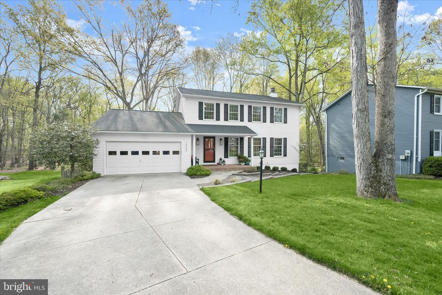 Nestled in the charming Hickory Ridge community, this delightful Colonial home offers a perfect blend of comfort and style. With 4 spacious bedrooms and 2.5 bathrooms, this residence spans 2,551 sq ft, providing ample space for relaxation and entertaining. Step inside to discover a warm and inviting interior featuring beautiful hardwood floors, recessed lighting, and built-ins that enhance the home’s character. The eat-in kitchen, complete with upgraded countertops and ample cabinetry, flows seamlessly into the family room, making it ideal for gatherings. Enjoy cozy evenings by one of the two wood-burning fireplaces, each adorned with elegant mantels. The primary suite boasts a walk-in closet and a private bath, ensuring a serene retreat. Outside, the 0.34-acre lot is a true oasis, backing to lush trees and offering a peaceful view of the garden and lawn. The landscaped yard features a deck and porch, perfect for outdoor dining or morning coffee. Located on a quiet cul-de-sac, this home provides a haven with no through traffic. Additional highlights include a fully finished basement with a walkout entrance, a two-car garage with inside access, and convenient main-floor laundry. The community amenities, including bike trails, playgrounds, and a community center, enhance the lifestyle here. This home is not just a place to live; it’s a place to create lasting memories. Don’t miss the opportunity to make it yours!