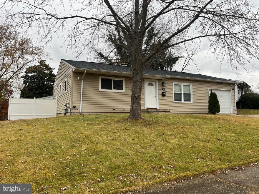 3 bedrooms. 2 full baths. Hardwood floors through out the 1st floor. Updated Kitchen with granite counters, stainless appliances. Ceramic tile floor in the kitchen and dining room. Fully finished basement with large family room. Possible 4th bedroom in the basement with attached full bath. Deck. Fully vinyl  fenced yard. Driveway and garage parking.