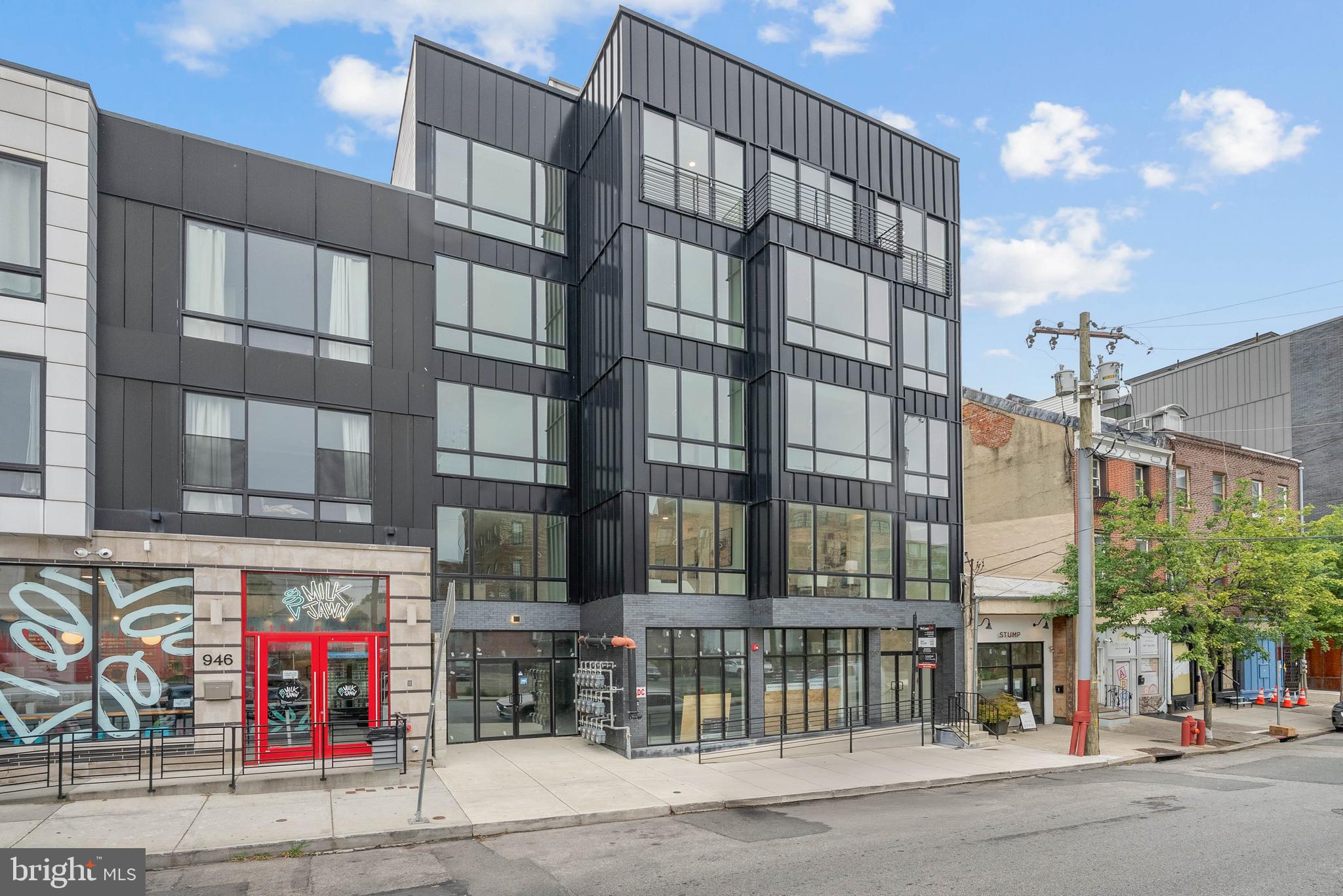 Introducing Artisans Edge – a stunning luxury condo development located on one of the most desirable blocks in Northern Liberties, one of Philadelphia’s most dynamic and sought-after neighborhoods. Known for its artistic roots, eclectic charm, and thriving food scene, Northern Liberties offers an unmatched blend of culture, creativity, and convenience. Artisans Edge features 13 thoughtfully designed residential units, each offering a modern and luxurious living experience with sleek, high-end finishes throughout. Choose from a variety of floor plans, all featuring spacious 2 bedroom, 2 bathroom layouts with open concept living, curated luxury finishes, a huge shared roof deck and top-of-the-line appliance packages. Live just steps from vibrant 2nd Street, where you’ll find some of Philadelphia’s best dining, nightlife, and boutique shopping. You're also minutes from neighboring Fishtown, giving you even more options for weekend brunches, craft cocktails, and live music. Parking is available (while spots last) at a nearby lot, making city living even more convenient. There is a new tax abatement. Taxes are not $1. Taxes & square footage are the buyer's responsibility to verify independently. Even though this is a new condo building, the Sellers preferred lender has 30 year fixed 5%-10% down mortgage products for this building. Please inquire with the listing team. The PAR Standard Agreement of Sale for New Construction of sale must be used for new construction properties whether completed or not.