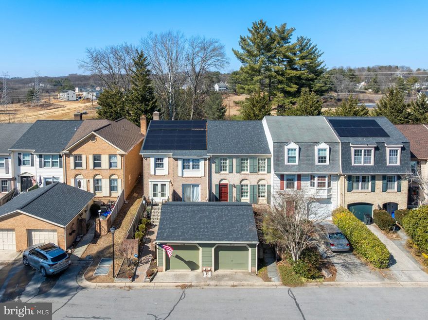 Welcome to this rare opportunity to own one of the larger 2700+ sqft all brick 4 bedroom 3.5 bath townhomes located in Greenside of Montgomery Village.  This 3 level sun filled home is in great condition.  It has beautiful hard wood floors, a remodeled half bath on the main level, large living room/dinning room area, eat-in gourmet kitchen with brand new stainless steel appliances and granite counter tops, a top level large master suite with fully remodeled master bath room, soaking tub, glassed floor to ceiling tiled shower and a massive walk-in closet, along with two additional bedrooms, a large finished basement with a cozy brick front wood burning fireplace, a front and rear deck with slider access to each.  The home also has a large front load one car garage next to a iron gate fenced main entrance refurbished brick walk way/patio, and a fenced backyard. A new roof with professionally maintained solar panels installed in 2018.  The community has plenty of guest parking, and is a short drive from I-270, The Metro, restaurants and shopping. Home warranty included.