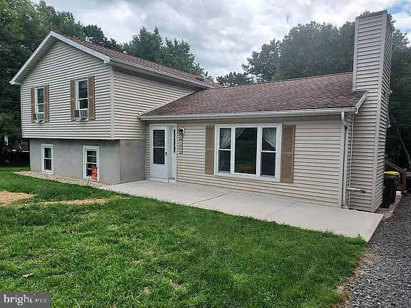 Beautiful move-in ready split level home with 1700 square feet including the finished basement with a large laundry/storage room and an office/computer room. There is a brand new septic system just completed in July 2025. There are 2 large storage sheds on the property. There is a large deck with a Sun Setter awning and a screen house kit. There is a large patio with an outdoor shower. The deck and patio overlook the spacious yard in a park like setting. There is new flooring throughout most of the house. The kitchen cabinets were recently redone with shaker style oak doors with soft close hinges. Furnishings and lawn care/snow removal equipment is negotiable. The house is ready to move in and start enjoying.