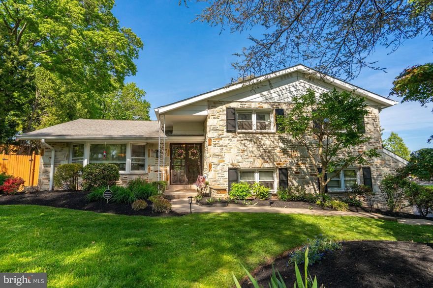 Welcome to 1228 Lois Road where thoughtful upgrades come together in a beautifully maintained  home. Pride of ownership is yours with a long list of improvements that make this property truly move-in ready. 
An open floor plan with vaulted ceiling living room and hardwood floors add timeless character.   The kitchen is both functional and stylish, offering solid wood cabinetry, granite counters, pocket doors and a full suite of newer stainless steel appliances.  Head upstairs to an open hallway of three spacious bedrooms. The primary suite offers a large walk in closet, double wall closet and a nook for desk space,  dressing or sitting area. The primary bath is updated with a Carrera marble shower and granite topped vanity.  The remaining two bedrooms are spacious with hardwood floors and good closet space.  The den  offers a large sitting room with sliders that open to the landscaped yard. The laundry room and full bath are just beyond the den.  Walk another short flight down to the finished basement where your living space has excellent flexibility. Perfect, to serve as an extra bedroom, home office, movie room or gym. Lots of closet space and storage. Major systems have been updated, including a heater and water heater (2021),  whole house water filtration system, new water softener, reverse osmosis filtration system for the kitchen (2025), and dual sump pumps.
 A bright and airy all season sunroom opens to the pool deck,  featuring new flooring and a ceiling fan.  The backyard centers around the heated pool, complete with a new filter, pump, and heater (2021), updated tile (2024).  A Jacuzzi hot tub sits just outside.  This manicured property offers a yielding Liberty apple tree, rose bushes and other blooming shrubs and a newer shed . Located in the tree lined neighborhood of Hideaway Hills, with its own playground. Close to the Ambler YMCA, Squires Golf Course, Talamore Country Club, Downtown Ambler, shopping and great restaurants. Minutes from Routes 309 and 63.  Just in time to enjoy your new pool this summer, schedule your showing today!