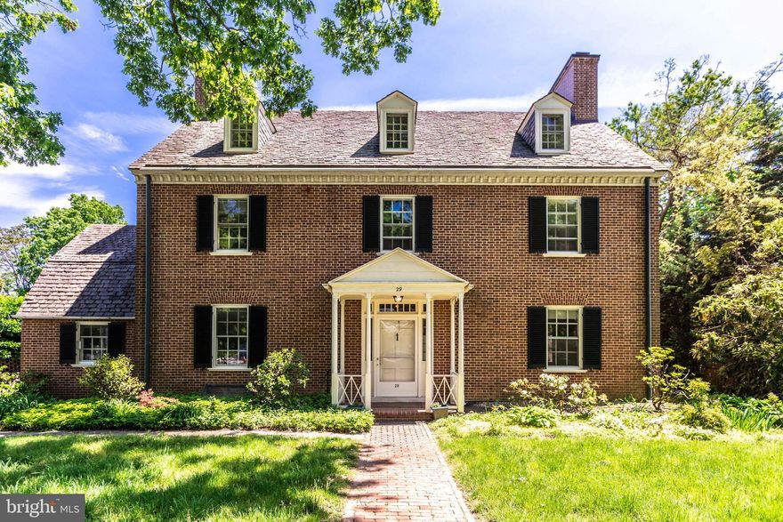 On the market for the first time in over 50 years, this impressive 6 bedroom, 3 ½ bath home, designed by renowned Baltimore architect Laurence Hall Fowler, is situated on a coveted block in Baltimore’s illustrious Guilford neighborhood. This home has been meticulously maintained according to Maryland Historical Trust standards with the addition of contemporary comforts, including central air and modern, energy-efficient, double-pane windows throughout. This house’s classic style boasts crown molding, high ceilings, hardwood floors, custom bookshelves, and four fireplaces. Enter through a grand foyer extending the full length of the house and explore the gardens on the other side, where a welcoming porch and stone patio beckon you to relax and enjoy the lush and expansive private grounds, a gardener’s delight. The first floor boasts separate formal living and dining rooms, both with fireplaces; a powder room; and an expansive, eat-in kitchen. A wide and open staircase leads to the second floor, which offers a primary suite with walk-in closet, as well as two additional bedrooms and a full bathroom. Just off the primary suite, the airy, screened-in sleeping porch with sweeping views of the majestic gardens below is one of many features adding to the beauty of this home. The third floor comprises three bedrooms and a full bathroom perfect for a private suite, children’s rooms, or simply more space for study, work, or play. The multi-room basement provides ample storage, possible additional living space, and is plumbed for a fourth full bathroom. Driveway and separate/detached 2 car garage. A perfect home for a family, this property is steps to Calvert School and located in the desirable Roland Park school district.