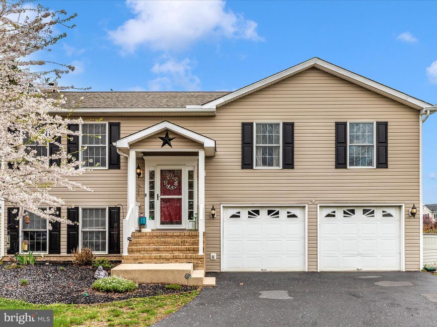 Welcome to 130 Oriole Lane, a beautifully maintained 4-bedroom, 3-full-bath home nestled in the desirable Spring Mills community of Falling Waters, West Virginia. This spacious residence offers comfort, functionality, and timeless appeal. The main living spaces are bright and open, ideal for both daily living and entertaining. Step outside to the rear deck and enjoy a private setting perfect for relaxing or dining al fresco. Key updates include newly installed bamboo flooring throughout the home, a new HVAC system in 2021, a 50-gallon water heater replaced in 2018, and a new roof completed in 2019, providing peace of mind for years to come.

Residents of this sought-after neighborhood enjoy a sense of community and convenience, with access to local parks, walking trails, and nearby schools. Just minutes from the growing Spring Mills Town Center, you'll find a variety of shopping and dining options including favorites like Fiesta Tapatia, Black Dog Coffee, and local eateries offering everything from casual bites to gourmet fare. Outdoor enthusiasts will appreciate proximity to the Potomac River and nearby state parks, ideal for hiking, boating, and weekend adventures.

Commuters will find this location especially attractive, with easy access to I-81 and major roadways for a smooth drive into Hagerstown, Winchester, or Martinsburg. For those traveling into the D.C. metro area, MARC train service is available from the nearby Martinsburg station, offering a practical and affordable rail option for work or leisure. Whether you're seeking the comfort of a well-appointed home or the charm of a connected community, 130 Oriole Lane is a wonderful opportunity to enjoy the best of Eastern Panhandle living.