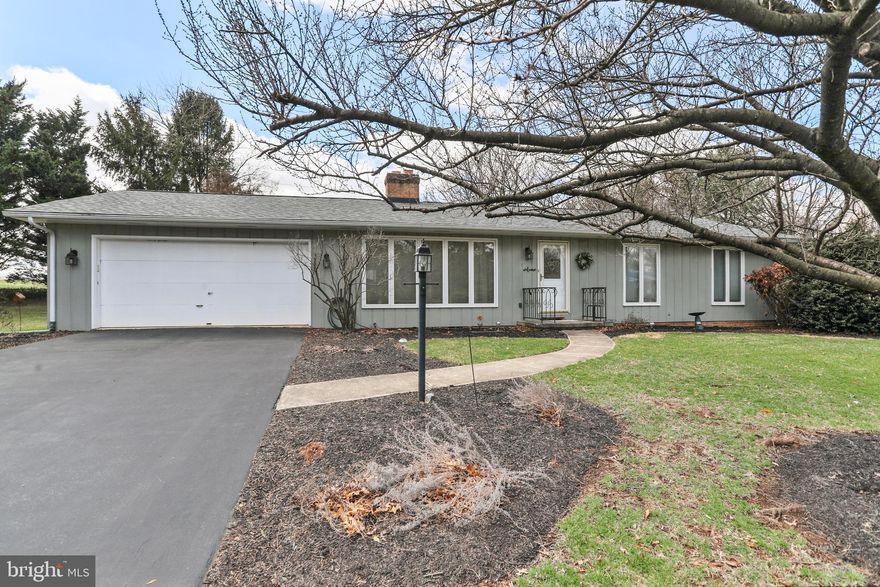 Welcome to this delightful 3-bedroom 2-bath rancher, perfectly situated on a spacious 0.46-acre corner lot! Featuring 1,421 sq.ft. of living space. As you step inside, you're greeted by beautiful hardwood flooring that flows throughout the home. The spacious living room is centered around a cozy wood-burning fireplace, perfect for relaxing evenings. The eat-in kitchen features white cabinetry, vinyl flooring, and all appliances, making it a functional and inviting space for meal prep and family gatherings. The primary bedroom offers a private en-suite with a walk-in shower. Two additional bedrooms share an updated hallway bathroom, which was updated just two years ago. A convenient laundry closet adds to the home's practical layout. Whether it's a sunny morning or a cool evening, the  bright and airy 3-season room connects you to the outdoors in comfort. Brand new roof installed in 2024, peace of mind for years to come. The sizable lot gives you plenty of room to enjoy the outdoors, whether you're gardening, entertaining, or simply unwinding. This home offers a serene atmosphere, while still being conveniently close to local amenities. Don't miss the opportunity to call this your new home!