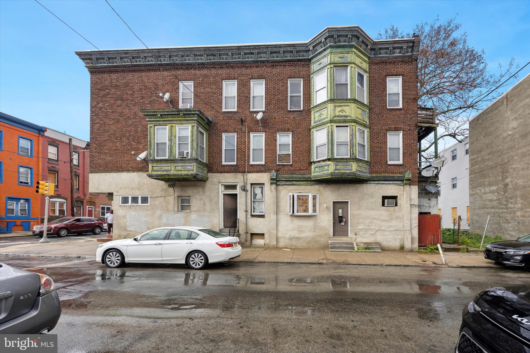 Commercial/Multi Unit Building Near Temple University coming soon!!! 2401 N 15th Street is a CMX-1 zoned corner property. Fully occupied income producing Multi unit property ready for new owner. 1st Floor was previous used as a business office and can be easily reverted back, however now an is a large 1bedroom apartment. With a separate entrance, the bottom floor has another large 1br apartment. Upstairs there are 2 -2bedroom apartments, both with open layouts and large bedrooms and spacious bathrooms. Over 2800 square foot property ready to go!!!!! Perfect for student housing, business and or a mix of both .. Located near Temple University, hospital , dining, and multiple lines of transportation. Great investment opportunity !!! Make your appointments today.