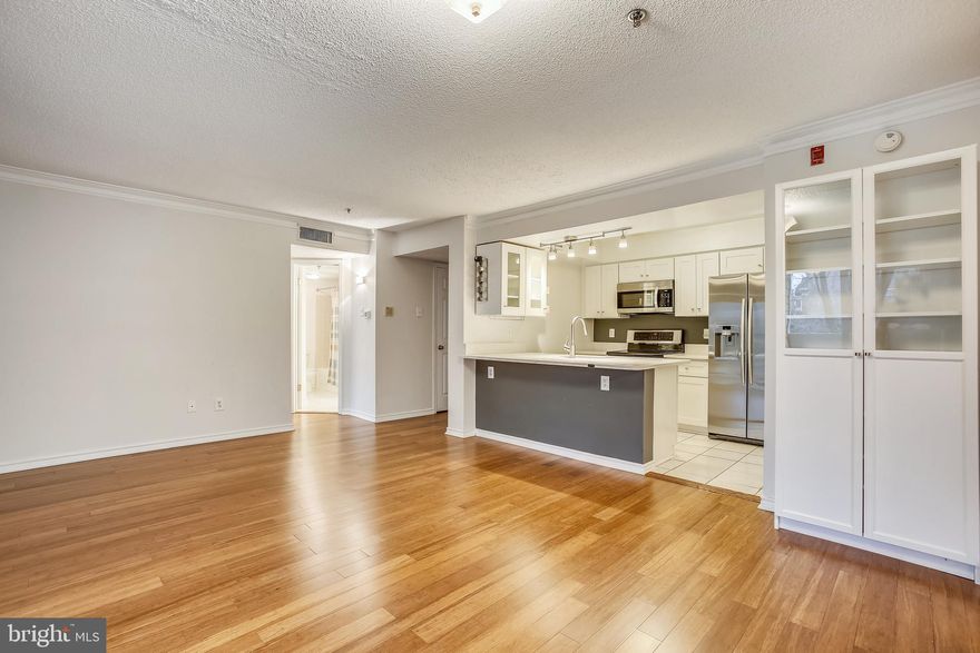 Wow! Beautiful and well-maintained 2 BR 2BA condo in The Fountains at McLean with TWO RESERVED GARAGE SPACES - a rare perk! This condo has a lot to offer.  Smile as you walk in with lots of natural light, spacious living room with balcony glass doors, open galley kitchen with quartz countertops, stainless steel appliances, and built-in microwave. Relax or entertain in your open dining and living room or make your way out to your private balcony with view overlooking the trees. Enjoy the two spacious bedrooms, both with walk-in closets. Appliances to include full-size front-loading washer & dryer, beautiful fridge, and updated flooring! Gorgeous onyx countertops in kitchen. Storage access on balcony.  Condo is VA approved.

Amenities include a clubhouse, fitness center, party room, business center, sauna, and outdoor pool.

The condo is in the heart of Tysons Corner. Premium location! 1.2 miles to Metro Station, less than 1 mile to Walmart Supercenter, half mile to Williamsburg Shopping Center even closer to Park Crest shopping center; 1.5 miles to Wegmans. Walking distance to Tysons Galleria, Tysons Corner Center, 2 MIN WALK to Harris Teeter & Starbucks, and easy drive to restaurants and more, and bus stop right out front! Easy access to Toll Road, 495, Rt 7 and Rt 123.
 
Come check it out! Location, Location, Location! In the heart of McLean and Tysons Corner!