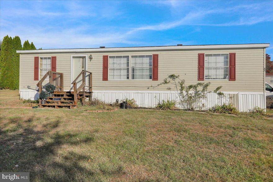 Enjoy the convenience of one floor living with this great Redman home in the Deer Run neighborhood with updated flooring and freshly painted interior. The owner has a new central AC unit, new hot water heater and furnace! Lot rent covers trash, sewage, snow removal and membership to community pool in the neighboring community of Indian Run. This is an excellent opportunity for affordable maintenance free living! Open House Sunday, February 2nd from 1pm-3pm!