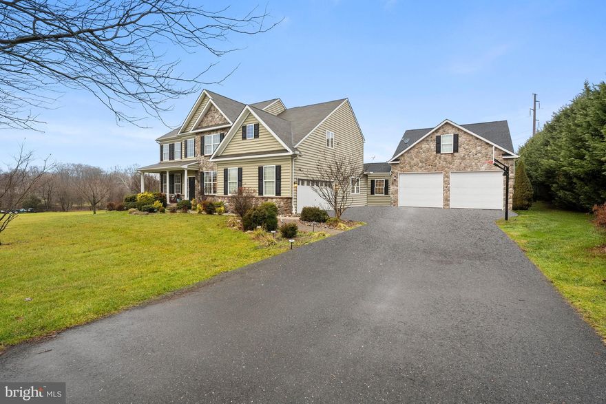 ENTERTAINERS DREAM!! Welcome to 41 Get Around Dr. This updated four car garage stone front colonial offers offer over 6,000 sq ft, of living and entertaining space and over 2,000 sq ft of patio which features an inground pool and Jacuzzi hot tub. Attached addition in 2018 offers a 20x30 oversized door two car garage in addition to a pool bar with large rolling door that over looks the pool, a full bath with stand up shower accessible from the pool or inside the garage, and a large rec room upstairs with a pool table. The pool bar incudes a wine fridge, sink, full size refrigerator, concreate countertops and plenty of cabinet space . The main level features recently upgraded LVP flooring, a two-story family room and foyer, a formal living room, a dining room, renovated half bath and a renovated kitchen  with a morning room, with updated cabinets, high-end stainless steel appliances, marble countertops, recessed lighting, custom built-ins and upgraded molding throughout. The family room features a pellet insert fireplace with a stone surround, Step out of the kitchen through French doors to a large paver patio where you can grill, sit by the built in firepit or soak in the Jacuzzi hot tub.  The upper level consists of  4 spacious bedrooms and 2 renovated full bathrooms. The totally renovated primary bathroom features a soaking bathtub, stand up shower and new tile flooring and built ins. The basement has 2 additional bedrooms, new full bathroom, complete gym with equipment and media/movie room. Enjoy entertaining in this one of kind custom built home!