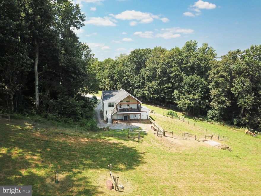 A rare, 26.4-acre equestrian haven in Unionville–Chadds Ford. About eight acres of open pasture roll into woodlands with a meandering creek and private trails—an ideal setting for training, hacking, and year-round turnout. A well-designed 4-stall barn with a heated tack room anchors the horse infrastructure, with ample space for equipment, hay, and trailer parking.

The existing, warmly updated converted-barn residence offers immediate, comfortable living (or a superb farm manager/guest option) while you plan and create a spectacular primary residence tailored to your vision—capturing long views over pasture and forest. Here, you can craft a true Chester County farmette or private estate with everyday convenience to downtown West Chester and Kennett Square, yet the quiet of Pocopson Township’s countryside.

Equestrian potential, estate-caliber setting, top-tier schools—this is the canvas to build the life you want.
