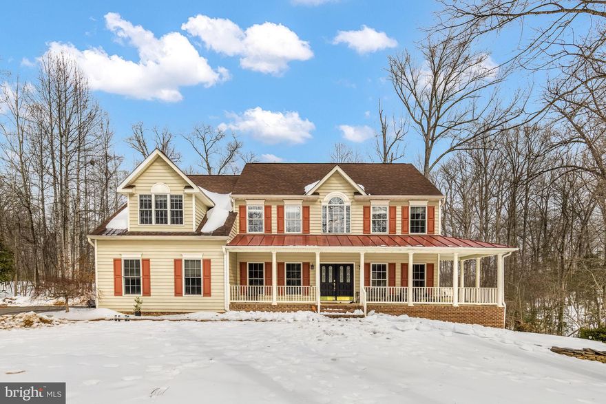 Priced to sell! Spacious 5 bedroom estate home in Magnolia Woods on nearly 4 acre lot with an in-ground pool that backs to trees for privacy. Interior features include 4,180 SF finished on main and upper levels with the potential for 6,125 total SF of living space.  Main level has a 2 story foyer, separate living and dining rooms, dedicated office with glass doors, gourmet kitchen with island, pantry, large family room with gas fireplace, powder room, and sunroom/breakfast nook that overlooks the wooded backyard and provides direct access to the decks and pool.  Upper level has 5 bedrooms, 3 full bathrooms, and laundry to include a grand primary bedroom with vaulted ceiling, walk-in closet, fireplace, and large ensuite with heated towel rack.  Unfinished walkout basement has 9 foot ceiling height and has been framed out to include electrical and plumbing for a large recreation area, additional bedroom, bathroom, wet bar/kitchenette area, and additional laundry hookup.  Exterior features include wrap around covered front porch, covered and screened back deck, multi-level deck that leads to the beautiful in-ground pool, firepit area, 2 car garage, and shed.  Recent updates include pool pump and filtration system, refrigerator, microwave, dishwasher, washing machine, carpet, and paint (main level), Great location zoned for and within minutes to Mountain View HS and convenient to shopping, dining, Quantico Marine Base, FBI academy, I-95 and several convenient commuting options to DC.  Owners have taken into account the home needs some updates and have priced the house under market value to reflect this. From morning coffee on the front porch to cozy nights by the fire or firepit and summer fun in the pool, this home is made for relaxing and entertaining—come see it for yourself!