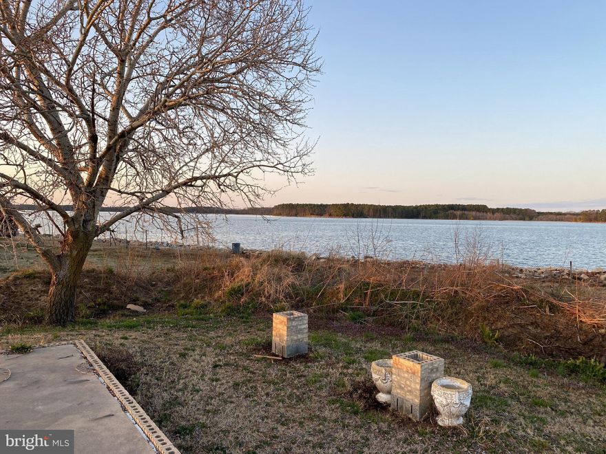 Waterfront land with a gorgeous view on St George Creek and Potomac River from the other side.  Foundation is already in place, which was elevated to meet FEMA requirements( Flood Elevation Certification). We have a builder and a lender. Working with a local and reputable builder and lender to put a package together.  Floor plan for 5 bedrooms in hands, the house will be custom to build. Public hook up to sewer, no perk needed. Riprap Shoreline,  Established seafood restaurant Ruddy Duck right around the corner. Beautiful place to live and call it home.