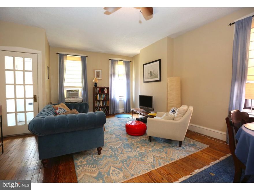 You will fall in love with this charming, corner, 2 bedroom, 1 bath brick front home, with rear yard. The facade has an original wood cornice with decorative brick, iron work, and exterior shutters. The corner properties are known for abundant light and a spacious layout and this home will deliver that and more! Enter in to a custom front door with transom window, a tile foyer entrance in the formal vestibule and a 15 glass panel privacy door. This home has mostly original flooring throughout and hard wood throughout. The living room and dining room are an open layout with ceiling fan, and a gorgeous original wood staircase with period hand rail in mint condition. The kitchen is restyled with white cabinetry, recessed lights, eat in and spacious with ceramic stove top, refrigerator and rear yard access. The 2nd floor has wainscot throughout, hardwood floors, some built in cabinetry and a completely re-style bathroom with new cabinetry. Basement is full and unfinished with laundry area. Abundant natural light in every room and radiator heating. Friendly neighborhood in walking distance to the Mercer Cafe and River Wards Cafe as well as in close proximity to many local favorite shopping spots, and restaurants. We welcome your visit today!