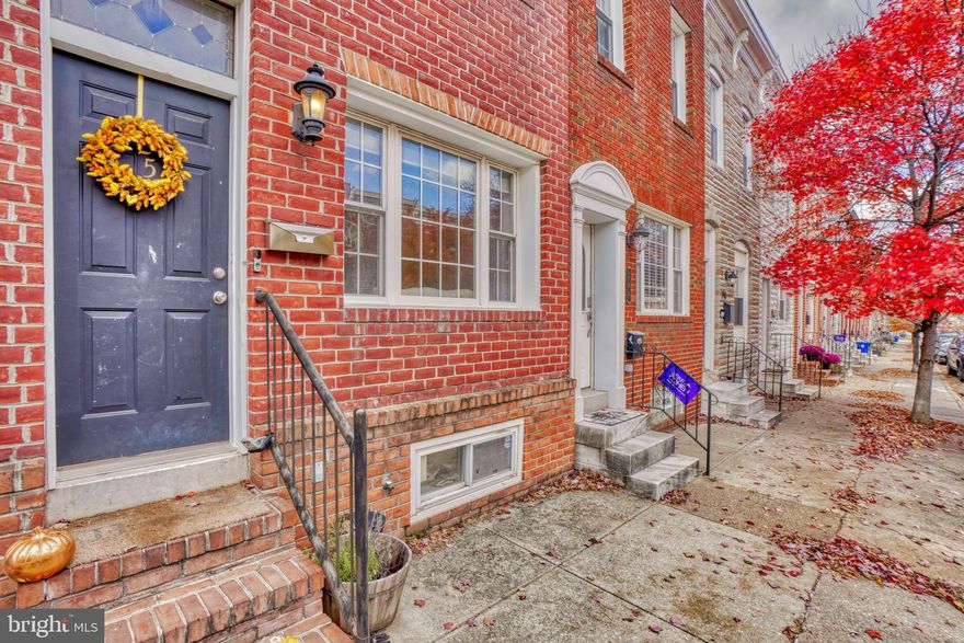 Celebrate the new year park side! This Patterson Park row home has all the items you want and under $300k. The house offers wood floors on the main level, perfectly accented by the exposed brick on both the main and 2nd levels. The main level has the popular open floor plan with an area for a dining room table and a kitchen island. The back door in the kitchen leads you to the PARKING PAD! A must have for city-living! Upstairs has a master bed with a private full bath and another bedroom with a 2nd full bath in the hallway. This house has a ROOF DECK with it's own entrance (not thru a 2nd floor bedroom). The front half of the basement is finished with space to make an additional bedroom or a family room. The laundry is at the back of the basement with additional storage space and a back door to out back. This location is in walking distance to Patterson Park. A cheap Uber ride to Fells Point and to the water's edge in Canton. Make your drive commute easy with the convenience to John Hopkins, 83, 93, and 895.