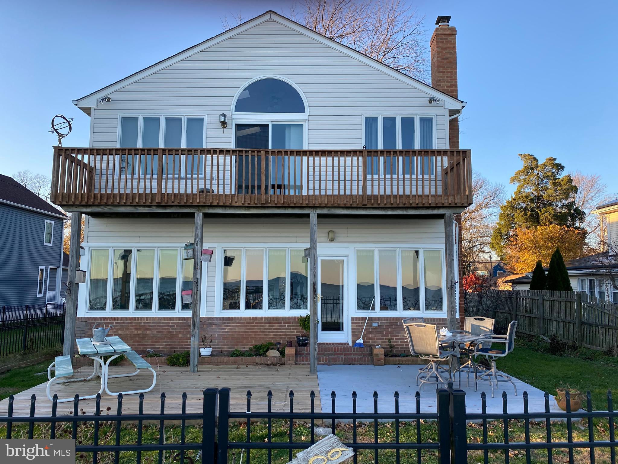 Are you in the market for a waterfront property with remarkable views then this is it! This home is truly unique in its location. Full waterfront views of Herring Bay, right next to the community pier, 2,100+ sq ft of waterfront living and the master has a deck over looking the bay. The home features walls of windows on each floor. You will have sweeping views of the Bay. From your private deck enjoy the sunset and sunrise, maritime activities, or barbeque and enjoy family time. Your property includes 3 bedrooms (Master with large bath, walk-in closet and a private deck), a second bath for guests, an open-layout , a large lving room with Bay views, a wood fireplace, and more. This home is a unique property perfect for those desiring breathtaking waterfront views. Go on vacation from home with the beauty of Herring Bay.