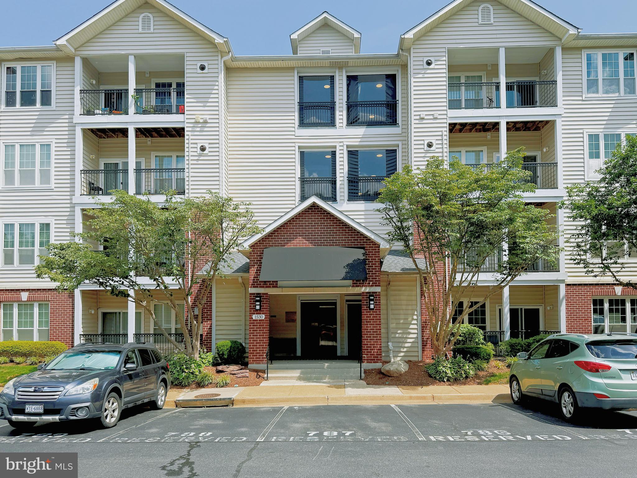 Ideally located in the highly sought-after Gates of McLean community, this freshly painted third-floor condo combines comfort, convenience, and modern style. Featuring 3 spacious bedrooms and 2 full bathrooms, this sun-drenched unit offers an open floor plan, a cozy gas fireplace, and a private balcony—perfect for relaxing or entertaining. The generous kitchen provides new appliances, ample cabinetry, and counter space, while gleaming hardwood floors flow throughout the living room and bedrooms, adding warmth and elegance. Each spacious bedroom features its own walk-in closet, providing ample storage space. The building is elevator accessible, ensuring convenience and ease of access. Enjoy the benefit of two assigned parking spaces along with two visitor parking permits—perfect for guests and added flexibility.
Recent updates:
Painting ( 2025), Washer(2025),Refrigerator(2025),Stove(2025),Diswasher(2025),Microwave(2025),New Lights(2025), Bathroom LED mirrors(2025).Water heater (2020), HVAC (2020).
Residents of this gated community enjoy access to top-notch amenities, including a fitness center, swimming pool, clubhouse, walking paths, and more. Just 2 blocks from the McLean Metro Station and minutes to Tysons Corner, Capital One Center, and an array of shopping and dining options, with easy access to I-495, Route 123, and the Dulles Toll Road. Offering a low-maintenance lifestyle in a prime location, this home is truly a rare find.