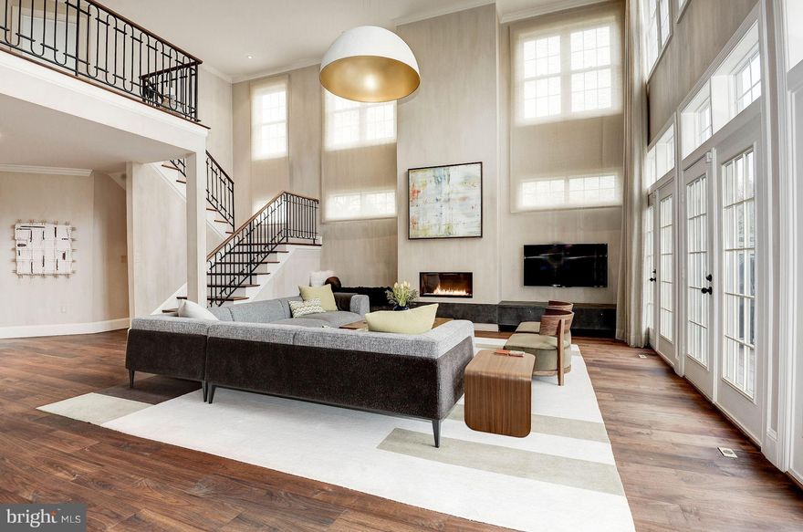 NEW PRICE! Impeccable style and quality craftsmanship come together in this beautifully renovated home. Showstopper kitchen: dramatic wine room, hi-end appliances, custom cabinetry, built-in espresso, steamer. Living Rm, w/ gas FP & 20ft+ ceiling, opens to deck overlooking lushly fenced, landscaped garden. Spa-like MasterBath. Walk-out LL w/ au pair suite, Family Rm, storage & two-car garage.