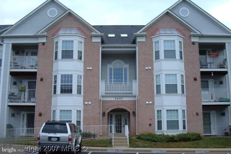 Perfect location, Convenient to all major routes. Second floor 2 bedroom 2 bath condo with gas fireplace and balcony. Brand new flooring. Secure building.