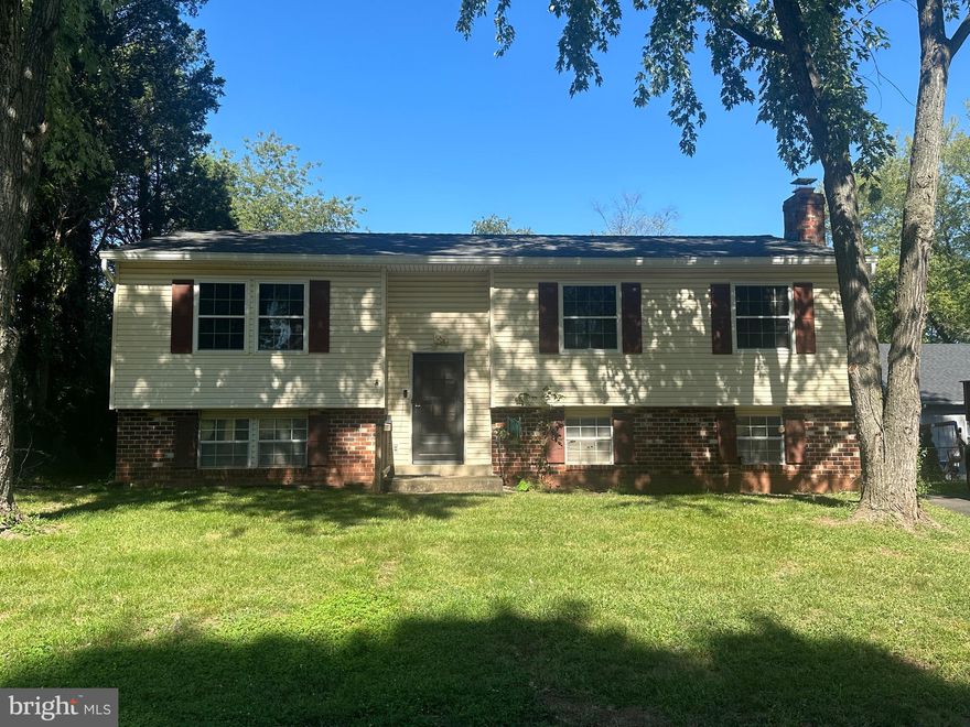 This four bedroom home has been stylishly remodeled to offer a gorgeous interior full of designer finishes! New beautiful bathrooms with custom tilework, shower/tub enclosures and hardware - Gleaming  new floors throughout! Kitchen boasts quartz countertops, 42" cabinetry w/ slow close doors & drawers and upgraded stainless steel appliances - The lower level feels like a main level! Multiple windows and a walkout to the backyard fill the basement with light!  No HOA!