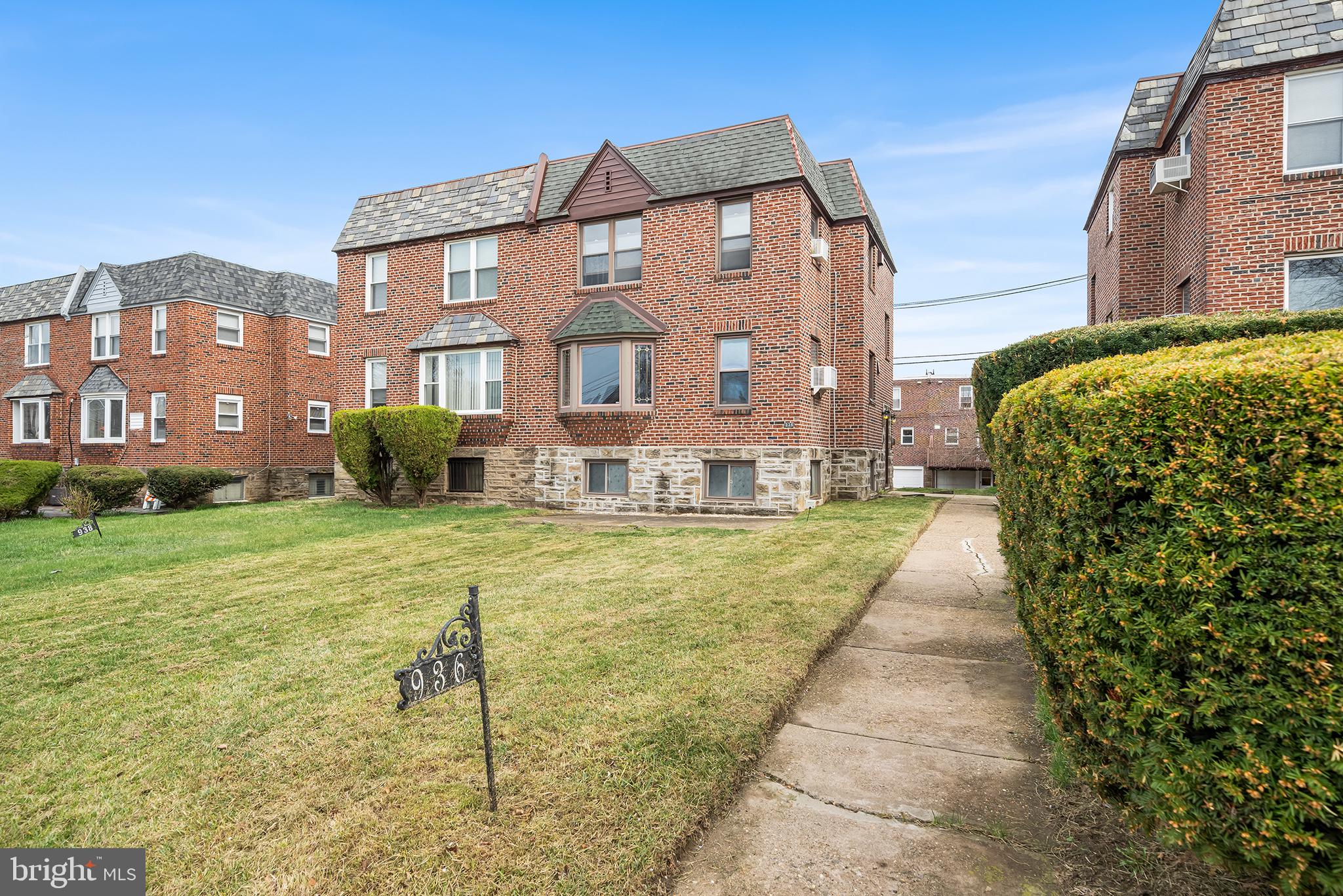 Highest and best offers due Tuesday April 8th at 11am. Welcome to 936 E Vernon Rd, a meticulously maintained twin duplex nestled in the heart of East Mount Airy. This solid brick and stone exterior duplex offers a fantastic investment opportunity or it can be ideal for an owner-occupant. Each unit features two bedrooms and one full bathroom, along with a generous living room, a formal dining area, and an open-concept kitchen. These units offer plenty of natural light and lots of storage. Both units have been freshly painted. The property features a 2-car garage and 2 car driveway. The 1st floor unit offers a private composite deck at the rear of the property, while also having a shared from patio. The lower level provides laundry, a powder room, and private storage lockers.