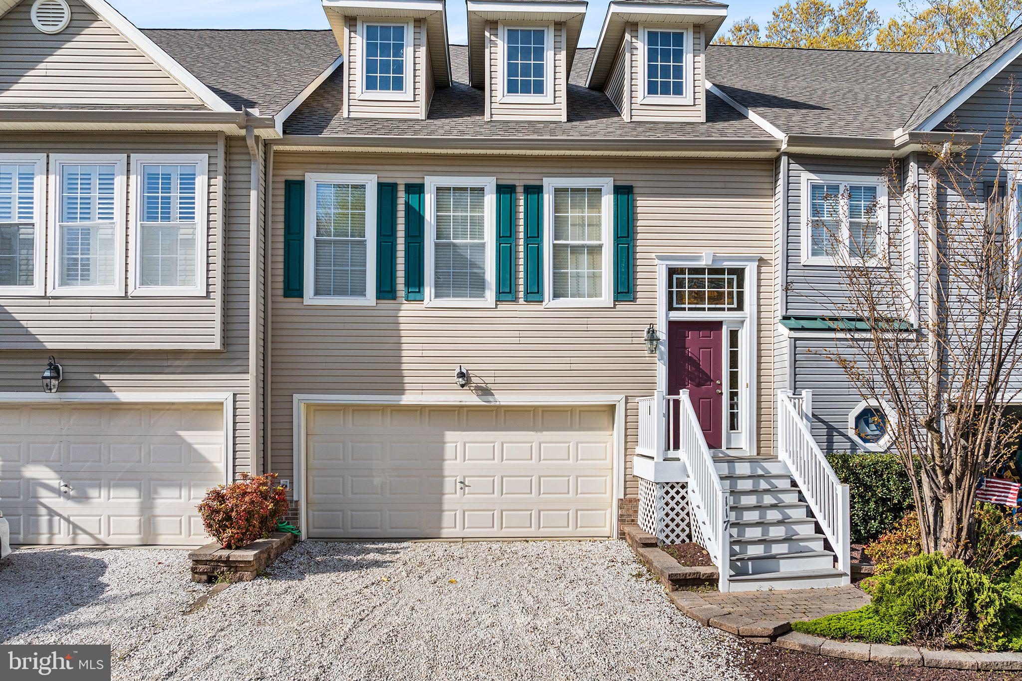 This spacious three-level townhome features 3 bedrooms and 3 full baths, plus a large 3rd level loft. Designed for comfort and flexibility. Step into the welcoming foyer, and just a few steps up, you'll find yourself on the main floor. This level offers an open-concept kitchen, dining, and living area that seamlessly connects to both a screened porch and an open deck—ideal for relaxing or entertaining in a private setting. The adjoining kitchen keeps you connected to the heart of the home, while the primary bedroom suite provides a peaceful retreat, complete with a soaking tub and a walk-in shower.
Upstairs, a large loft overlooks the main living area, offering a versatile space perfect for guests, a home office, bedroom or an additional lounge area.
From the foyer, a short staircase leads down to the ground floor, which includes two more bedrooms, a full bath, a cozy family room, and a separate laundry room. An oversized two-car garage completes this level, providing ample storage and convenience.
Perfectly positioned near the beach, this home offers easy access to the yacht club, marina, pools, kayak storage and launch, and the golf club—inviting you to enjoy the very best of coastal living. Located within the vibrant Ocean Pines community, you’ll also enjoy scenic walking trails, parks, multiple pools, boat ramps, and a lively farmers market every Saturday. Nearby attractions such as the St. Martin’s River, Assateague Island, and Ocean City offer endless opportunities for outdoor adventure and seaside relaxation.