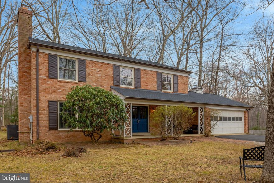 This elegant all-brick home sits on a flat, nearly 1-acre lot in a peaceful, rural Oakton setting and offers a perfect blend of classic charm and timeless appeal. The main level features beautiful hardwood floors, spacious formal living and dining areas, a functional kitchen, and a sunroom that overlooks a low-maintenance backyard with mature trees. Upstairs, you’ll find 5 generously sized bedrooms, including a primary suite, along with well-appointed bathrooms and large closets throughout. The fully finished basement adds valuable living space, walk-up access to the backyard, and a huge workshop perfect for hobbies or storage. Andersen windows and doors provide comfort and efficiency. This home delivers space, privacy, and convenience in one stunning package.