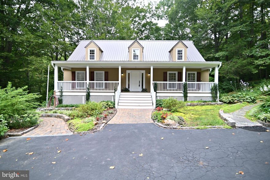 THIS IS A 10!!  IMMACULATE CAPE COD ON A PRIVATE 2.93 ACRE WOODED LOT.  STUNNING PERENNIALS TO ENJOY.  UPDATED KITCHEN WITH SILESTONE COUNTERS AND STAINLESS APPLIANCES.  UPDATED BATHS W/ GRANITE COUNTERS AND LUXURY VINYL.  GLEAMING HARDWOOD FLOORING ON FIRST LEVEL AND NEW CAPET UPSTAIRS.  ENJOY THE SCREENED-IN DECK OR COZY FAMILY ROOM W/FIREPLACE.  GREAT INDOOR AND OUTDOOR LIVING!!