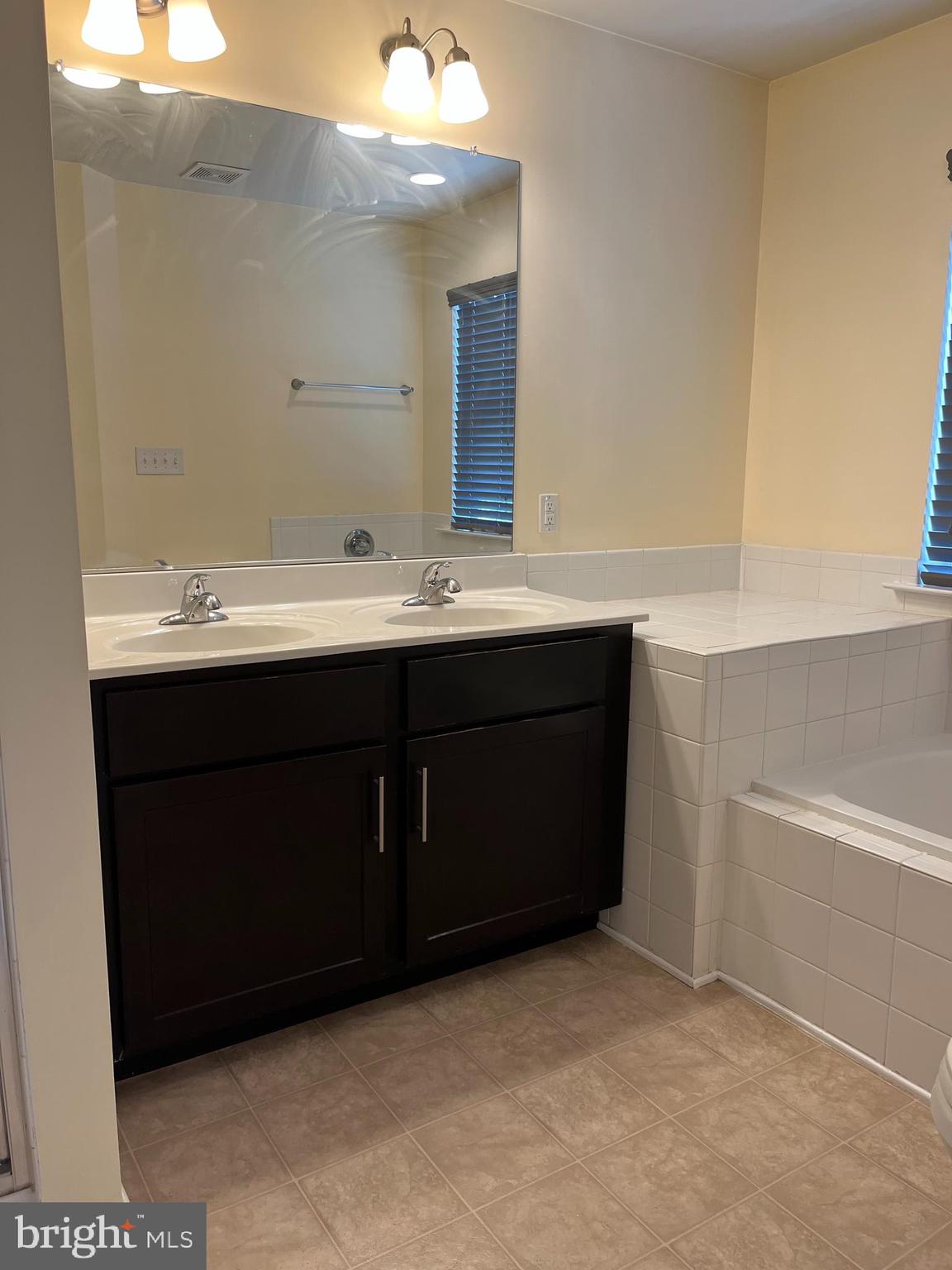 THE TOWNES AT TASKER - Residential Lease