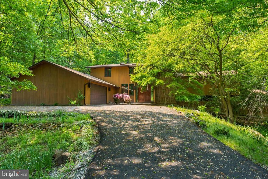 Over 4200 square feet of living space! 4 bedrooms, 4 full baths, Hardwood floors through-out main level, Beautiful Kitchen, Entire home drenched with loads of sunlight, Beamed Cathedral ceilings, skylights, 2 raised-hearth fireplaces, Solarium with Jacuzzi, separate loft study overlooking living room, amazing backyard with warp around marble patio and much more! Immediate occupancy!