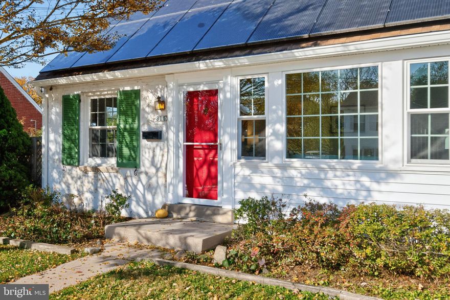 Welcome to this enchanting Cape Cod home nestled on a peaceful, one-block street in the highly desirable Northwood Village neighborhood. There is a VA assumable loan at 3.5% interest rate. Conventional/VA/FHA financing are all possible. This special property combines classic charm with modern comfort, all within convenient reach of downtown Silver Spring.  Set on a generously sized, beautifully landscaped lot, this home invites you in with warm hardwood floors that flow throughout the main level. You'll love the recently renovated kitchen with white cabinets and quartz counters.  The spacious main level primary bedroom is a true retreat, featuring a dedicated office space and a cozy sitting room area—perfect for morning coffee or evening relaxation. Upstairs, you'll discover 2 additional bedrooms, a full bath, and a den/study area that offers wonderful flexibility as a fourth bedroom, home office, or creative space. Fully paid for solar panels will save you money on electricity (see utility cost disclosure).  When the solar panels were installed in 2019, a new roof was installed.  The water heater is less than one year old. The thoughtfully designed floor plan provides both gathering spaces and private corners for everyone. Step outside to your own private oasis: a welcoming patio opens to a fully fenced backyard with a storage shed, ideal for entertaining, gardening, or simply enjoying quiet moments outdoors. This is more than just a house—it's a home with character and warmth waiting to embrace its next chapter. Come experience the magic for yourself!