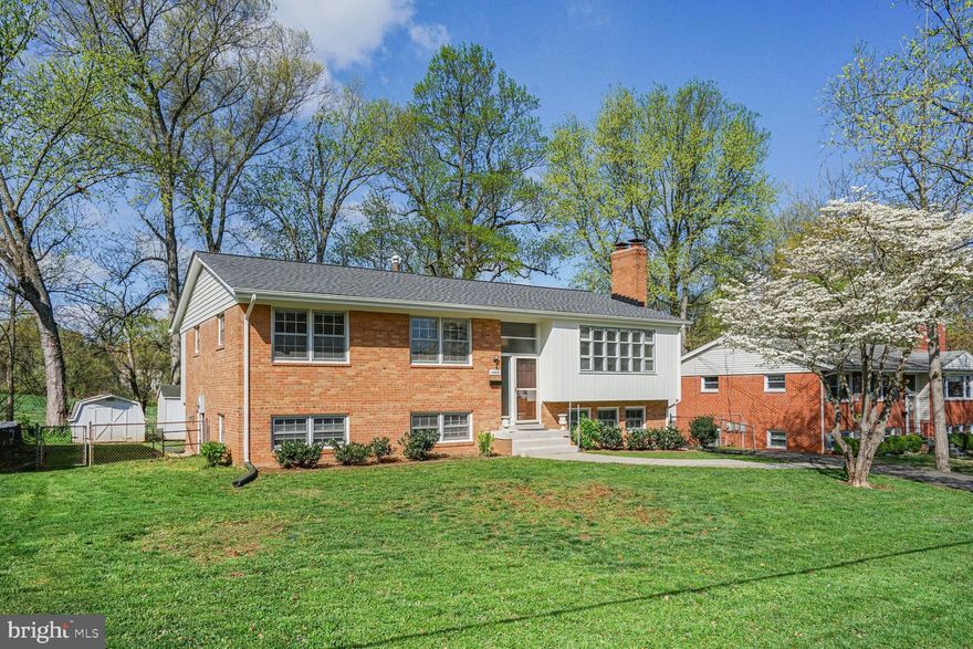 1068 Carper Street, a split level single-family home with five bedrooms and three full bathrooms is situated in the coveted Langley neighborhood of McLean, Virginia. The location provides convenient access to top-rated Fairfax County Public Schools, including Churchill Road Elementary, Cooper Middle, and Langley High School. This residence offers a wonderful opportunity to reside in a highly desirable Northern Virginia location. Featuring approximately 2,596 square feet of living space, this home is on a generous lot of roughly 10,500 square feet.  The home has been freshly painted inside and out, has new blinds on most windows, and a new refrigerator. The large flat backyard is fully fenced and backs to Churchill Road Elementary School.  The back yard fence gate that allows children to walk from home directly to the school. Enjoy living in the prestigious Langley area, with close proximity to Tysons Corner and Washington, D.C., offering a blend of peaceful residential living and easy access to urban amenities.