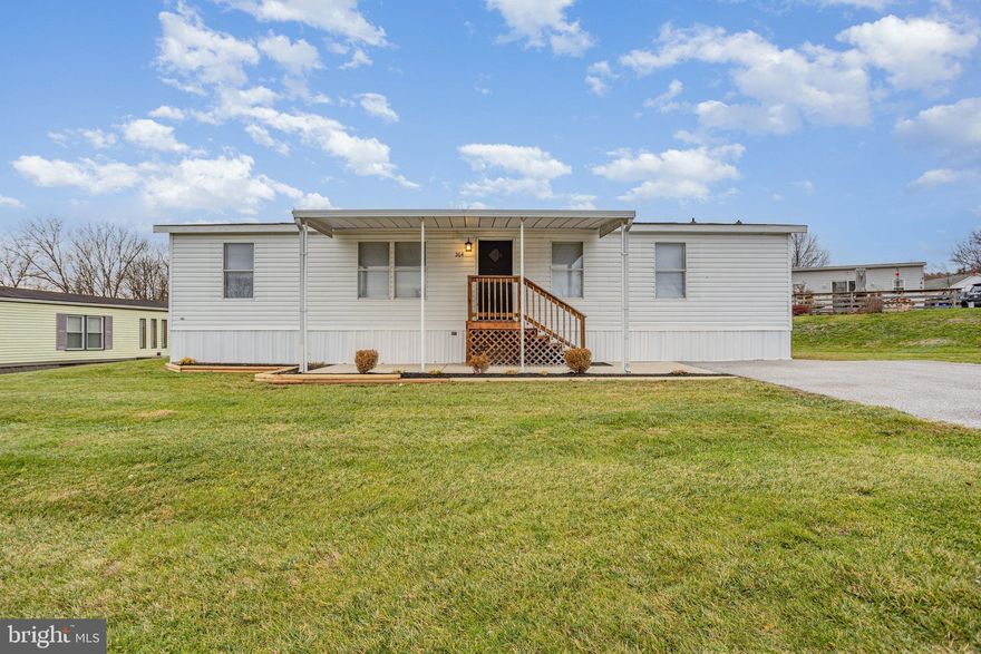 Newly renovated  3 bedroom, 2 bath home located in a quiet neighborhood on a cul-de-sac street.
This charming home has new carpet , luxury vinyl plank flooring , new lighting, new blinds and fresh paint. 
The gorgeous galley kitchen features beautiful cabinetry with an abundance of storage space along with granite countertops,  stainless steel appliances  and a wine fridge.  A connected laundry space has a washer and dryer that are included with the home.
The updated  primary bath has a large soaking tub with brand new tile surround, while the master bedroom features a large built-in closet system.
The exterior of the home has a newer roof, new skirting, fresh landscaping and a brand new Amish built step and deck side entrance. Seller is a licensed PA real estate agent.
Lot rent is $540 per month and includes sewer.