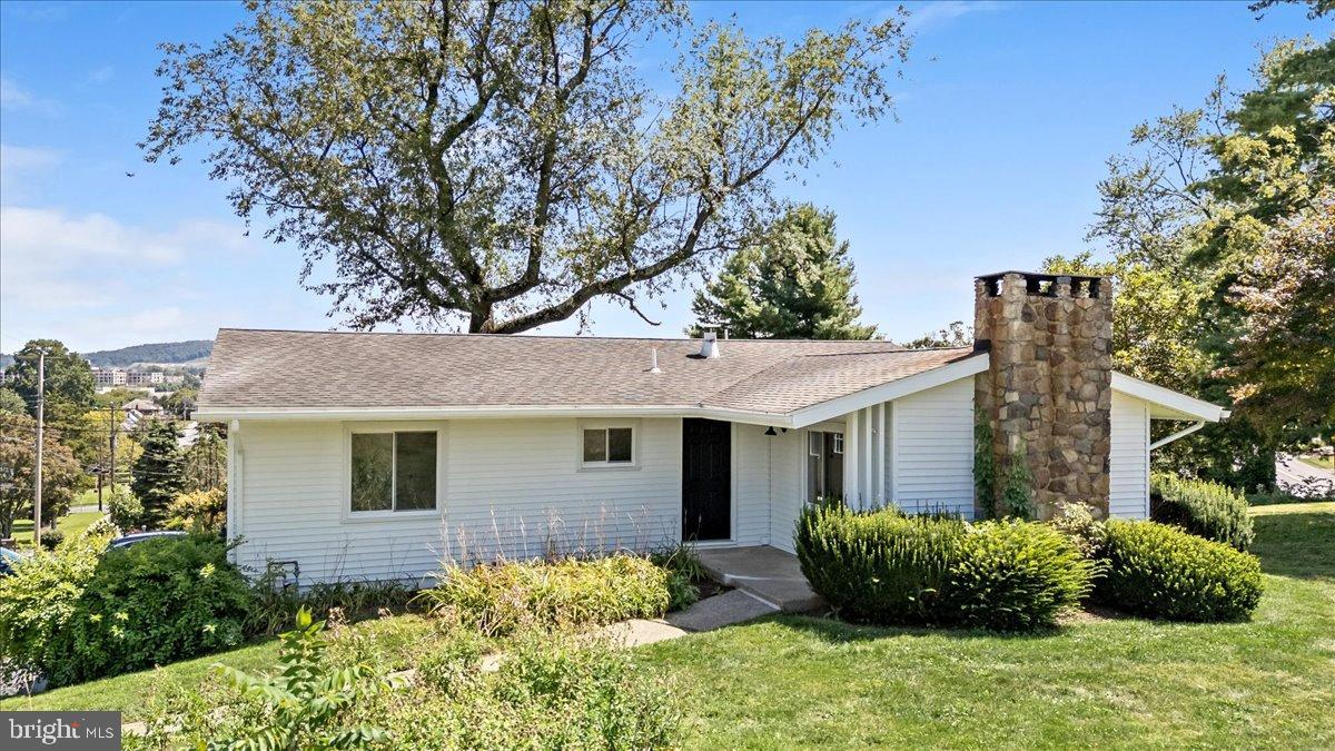 Completely remodeled from top to bottom, this 3-bedroom, 1-bath ranch delivers modern style, functionality, and exceptional value in a prime location. Every detail has been updated, including new laminate flooring, fresh paint, recessed lighting, upgraded fixtures, and a fully finished lower level. The stunning kitchen features shaker cabinetry, quartz countertops, subway tile backsplash, and stainless steel appliances, flowing into a bright dining area and living room with a stone fireplace. The spa-inspired bathroom offers a marble-top vanity, tiled tub/shower, and sleek black hardware. The lower level adds a spacious family room with stone fireplace, a home office/den, laundry/utility room, and extra storage. Outside, enjoy a generous corner lot with mature landscaping and room to relax or entertain. Located minutes from Routes 78 and 22, this home offers an easy commute to New Jersey, while nearby shopping, dining, parks, and schools add everyday convenience. With every surface renewed and no projects left to tackle, this turnkey property combines modern living with unbeatable accessibility—perfect for buyers seeking style, comfort, and location in one move-in ready package.
