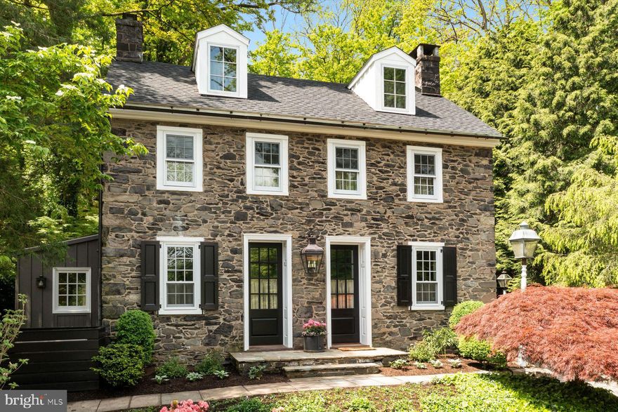 Experience historic charm and modern convenience in this stunning stone home, Circa 1790-1808. Boasting 3 bedrooms and 3.5 bathrooms, this residence is a true gem. Step inside to discover original hardwood flooring, 2 cozy fireplaces, and exposed wooden beams that exude character.

The galley kitchen is a chef's delight, featuring honed granite countertops, natural wood finished   cabinets, with brick flooring. Equipped with a GE Cafe stainless convection oven and a 6-burner gas cooktop, this kitchen is both stylish and functional. The adjacent breakfast/dining room offers a picturesque view of the pool and garden through a wall windows.

On the first floor, you'll find a convenient laundry/mudroom with a half bath. The second floor is home to the primary bedroom with a spa-like en-suite bath, a guest bedroom with an en-suite bath, and tranquil back garden views. Ascend to the third floor to discover a spacious third bedroom with its own bathroom, occupying the entire level.

Outside, enjoy the heated cocktail pool, three flagstone terraced patios, lush gardens, cobblestoned car park, fenced rear yard, and a grill with a direct propane hookup. Recent upgrades include whole-house security, Sonos and network systems, chandeliers in the living and dining rooms, new bead board accents in the primary bedroom, and more. The property also features a backup generator with  custom-built enclosures for the propane tanks and generator. Additionally, there is a new heating boiler, European hot water baseboards on main floor, a new water softener, new roof and all new windows.

Let natural light flood the space as you relax in this picturesque setting. Located in the village of Point Pleasant in the historic Delaware River Valley, this home offers easy access to NE corridor travel routes. I-78 is a mere 15-minute drive away, while NYC and Philadelphia are just 90 minutes and 60 minutes away, respectively. Enjoy proximity to the Delaware River canal and seasonal river views, along with recreational activities like hiking, cycling, boating, fishing, and exploring horse country. Nearby shops and restaurants in New Hope and Lambertville add to the allure of this exceptional property.