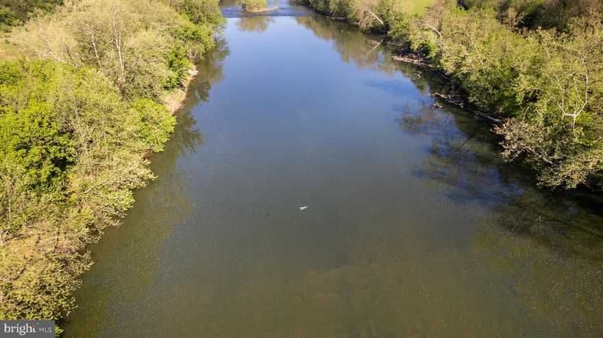 Here’s your opportunity to own the property of your dreams - RIVERFRONT, on a gorgeous lot, this log home has incredible potential!  This type of opportunity doesn’t come along often!!  The coveted, private neighborhood of Thunderbird Farms is located in the picturesque Shenandoah Valley.  The large lots allow plenty of privacy, and gently slopes to allow easy access to the river.  With over 200’ of river frontage, your home and property will be the envy of all your friends!  The beautiful, log home has a new roof and is ready for your thoughtful, creative touches.  Enjoy the convenience of one-level living, with 3 bedrooms on the main floor and hardwood flooring throughout.  The wraparound porch offers spectacular views of the river - it’s where you’ll spend hours relaxing, reading, and spending time with loved ones.  The walkout basement is a blank canvas to finish any way that suits your lifestyle - a gym, guest suite, extra bedrooms, game room, you name it!