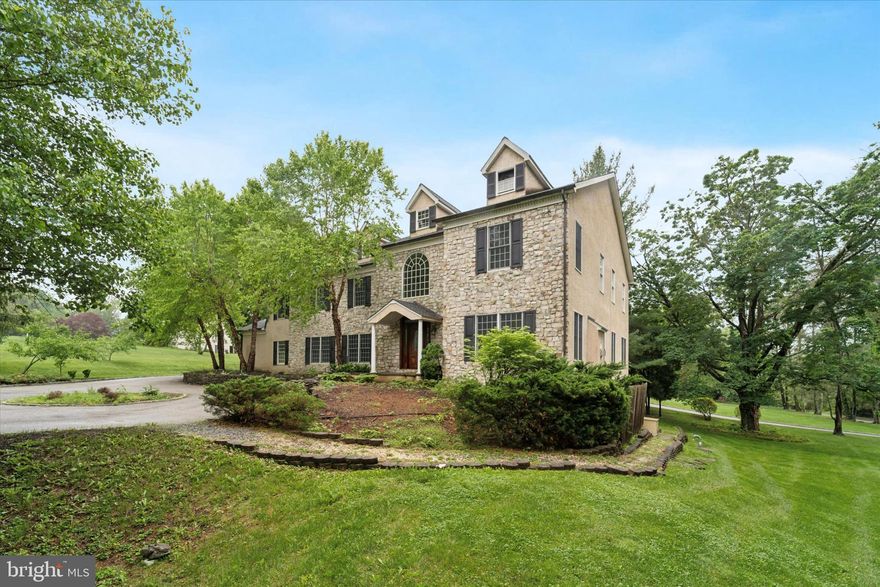 This impressive 8,000+ square foot home offers a perfect blend of timeless elegance and modern functionality. Step inside to a spacious tiled entryway flanked by beautiful hardwood floors, setting an inviting and refined first impression.

With five generously sized bedrooms — including a versatile in-law, guest, or au pair suite in the finished walkout basement — plus five full baths and two powder rooms, this home delivers exceptional space and flexibility for today’s lifestyle.

The formal living room, complete with a gas fireplace and tray ceiling, provides a serene view of the beautifully landscaped front yard. The adjoining formal dining room connects to the gourmet kitchen through a butler’s pantry — ideal for entertaining. In the kitchen, you’ll find abundant counter space, modern appliances, and room to gather. A cozy family room and a spacious home office complete the main level, offering comfort and convenience.

Upstairs, the primary suite serves as a true retreat, featuring a sitting area, luxurious full bath, and an expansive walk-in closet. The finished walkout basement adds four additional flexible spaces — perfect for a gym, media room, or playroom — along with the in-law/guest suite for extended stays.

Step outside to enjoy a private enclosed rear yard and expansive side yard, ideal for outdoor entertaining, play, or relaxation. The attached three-car garage and circular driveway provide ample parking and storage, while the composite faux slate roof adds enduring beauty and quality. Inside, three separate heating zones ensure comfort and efficiency throughout every season.

Located near top-rated public and private schools, this home offers easy access to major highways and is close to shopping, dining, and everyday conveniences. Don’t miss the opportunity to make 1 Dunminning Road your forever home.