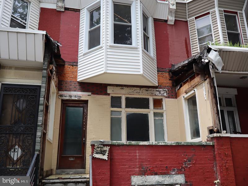 Don’t miss this two-story brick rowhome built in 1940, located in the highly desirable and offering lots of potential with some work. North section of Philadelphia. This residence features an open front porch, a spacious living room, a formal dining area, and kitchen with walkout access to a fenced rear yard—perfect for relaxing or entertaining outdoors. Upstairs, you'll find three generously sized bedrooms with ample closet space and a full three-piece hall bath (which is in great condition). The full, unfinished basement, offering excellent potential for storage or possible future living space. Conveniently located near local shopping, schools, public transportation, and major roadways, this home combines comfort, convenience, and great value.