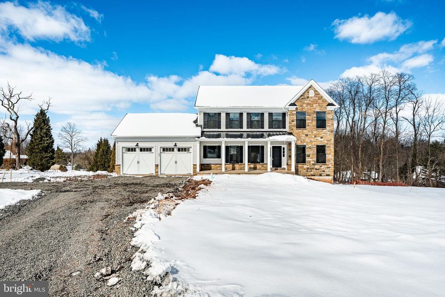 Welcome to this stunning brand-new construction home offering the perfect blend of modern design, functional living, and an unbeatable location. Situated on over an acre of land, this beautifully crafted residence provides privacy, space, and convenience just minutes from the vibrant shops and restaurants of downtown Phoenixville.  Step inside to an open and inviting main level designed for today’s lifestyle. The spacious open floor plan is filled with natural light and centers around an expansive kitchen that offers abundant cabinetry, generous prep space, and seamless flow into the main living areas. The living room is highlighted by a cozy wood-burning fireplace, creating the perfect gathering space for relaxing evenings or entertaining guests. The first floor also features a highly desirable bedroom with its own private ensuite full bathroom, ideal for guests, multi-generational living, or a private home office.  Upstairs, the second level continues to impress with a thoughtfully designed layout. A convenient second-floor laundry room adds everyday practicality, while two additional bedrooms share a well-appointed full bathroom. The luxurious primary suite serves as a true retreat, featuring two walk-in closets and an oversized ensuite bathroom complete with a soaking tub, offering the perfect place to unwind.  The fully finished walkout basement provides even more versatile living space, ideal for a recreation room, home gym, or additional entertainment area.  Completing the home is a spacious two-car garage equipped with an electric vehicle charging outlet, adding modern convenience to this already impressive property.  With over an acre of land, never lived in brand-new construction, and close proximity to the charm and energy of downtown Phoenixville, this home offers the perfect balance of peaceful living and easy access to dining, shopping, and entertainment.  PLEASE NOTE: Buyers and their agents to verify square footage of home and finished basement.  Some Rooms have been virtually staged.  Once  the Chester County Assessment is received, seller will file an appeal.  THP Builders still to install new shutters on front stone section.  As soon as weather permits, THP Builders also to finish the driveway, rake and seed yard and install stone trenches along driveway. Additionally, builders to install scribe molding at kitchen cabinets along with all handles and replace bubbled tile in primary bedroom shower.