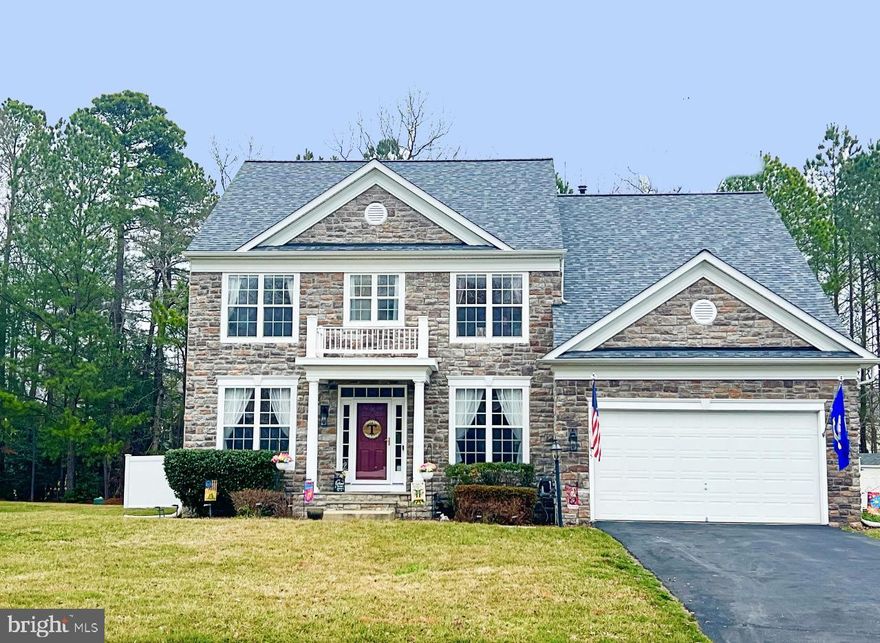 Welcome to your new place to call home! Stunning property in the sought after community of Chatham Village. This home is an entertainer's dream with a fully finished basement and professionally landscaped yard.  Enter through the gracious foyer leading to the classic living room  filled with tons of natural light. The gourmet kitchen  has  beautiful raised- panel cherry cabinetry, backsplash, and granite counters.  Stainless steel appliances include gas cooktop, microwave, dishwasher, double oven and refrigerator/freezer.  The primary suite includes has a cozy gas fireplace, sitting area, and separate his and her closets. The en suite features a double vanity, beautiful tile,  shower, and a large soaking tub.  Two secondary bedrooms share a Jack and Jill bathroom.  Another secondary bedroom has an attached private bathroom. The fully finished basement is perfect for hosting game day! The media/entertainment room has a projector and screen.  A wet bar with lots of counter and barstool space that is perfect for gatherings.  Step outside to a fully fenced in and professionally landscaped backyard.  Just in time for summer, relax by the stunning patio.  The roof is just over a year old.  Great location for commuters and within a five minute drive to Dahlgren.  Check out the virtual tour.  Schedule your showing or plan to attend an open house and make your offer before this home is sold!