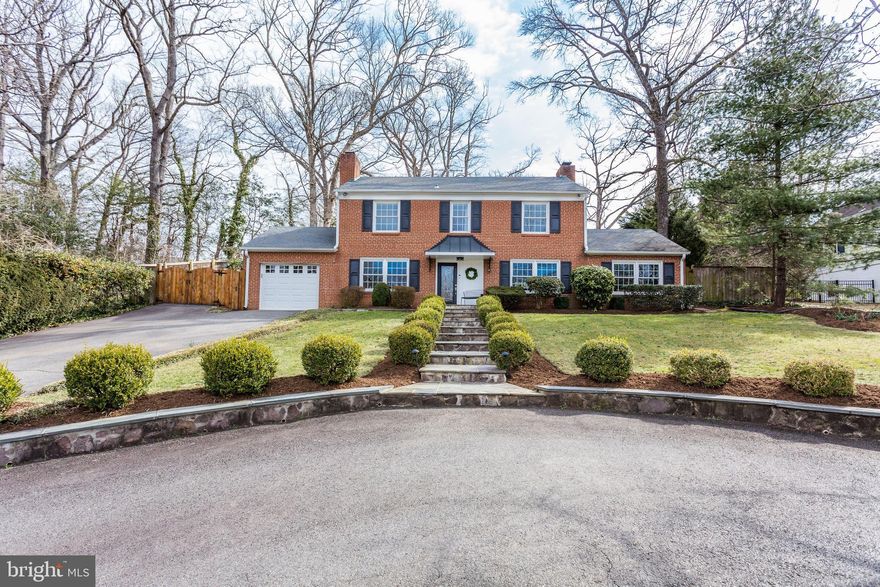 Elegant and pristine all brick colonial located in lovely Marlan Forest.  This 4 BR, 2.5 BA home has a wonderful open floor plan flow on main level w/ living, dining, kitchen and family areas, gleaming hardwoods and 2 fireplaces.  4 generous sized bedrooms and 2 full baths on upper level with pretty "treehouse" views out each window.  Perfectly designed landscaping in front and back, flagstone patio, large heated pool and spa and plenty of green space.  Circular driveway and main driveway leading to attached garage for ample parking.  Meticulously maintained top to bottom.  Turnkey, move in ready!  A beautiful opportunity.