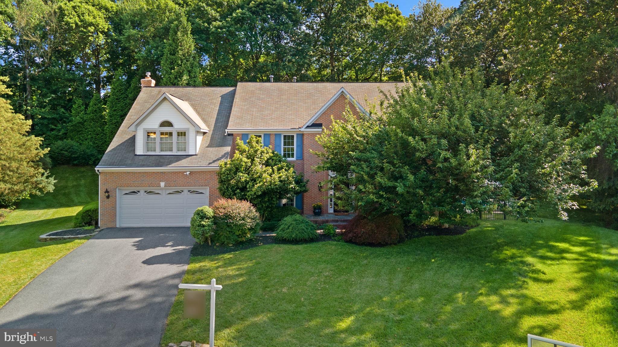 Welcome to this meticulously maintained 5-bedroom home in the highly sought-after Waverly Woods community. From the moment you enter the welcoming two-story foyer, you'll appreciate the quality and care throughout. Just off the foyer, French doors open to a private home office, ideal for today's remote work needs. The formal living and dining rooms feature elegant crown molding, with the dining room also showcasing detailed wainscoting for added charm.
The spacious eat-in kitchen is a dream, offering granite countertops, a large center island with seating, stainless steel appliances including a gas cooktop and double wall ovens, and plenty of cabinet space. A sliding French door leads from the kitchen to a beautifully designed outdoor retreat—complete with an expansive patio, stone wall, pergola, and a sparkling, heated saltwater in-ground pool, all set against a wooded backdrop for added privacy.
The family room is warm and inviting, featuring refinished hardwood floors (2017) and a floor-to-ceiling brick fireplace. A convenient half bath is also located on the main level, while large windows throughout the home fill the space with natural light.
Upstairs, you'll find five generously sized bedrooms, a hall bath with double sink vanity, and a dedicated laundry room. The luxurious owner's suite includes two oversized closets and a spa-like ensuite bath with a large shower, separate soaking tub, and a double sink vanity. One additional bedroom has an attached bath that also connects to the hallway—perfect for guests.
The finished lower level offers incredible versatility with a large open area ideal for a media room and home gym, a full kitchen, a full bathroom, and an additional room that can serve as a sixth bedroom or second home office. With a private entrance, this level is perfect for an in-law or guest suite.
Additional highlights include a two-car garage, mature landscaping, and a fully fenced backyard backing to woods for serene privacy. All windows were replaced in 2017, with triple-pane windows along the rear of the home for added energy efficiency and enhanced sound insulation, further supported by dual-layer sheetrock. Other updates include two new HVAC units (2017), pool and fencing (2020), new front walkway and resurfaced asphalt driveway (2021), new water heater (2022), and fresh paint and carpet throughout (2025).
This exceptional home truly offers it all—space, updates, privacy, and an unbeatable location. Don’t miss your chance to make it yours!