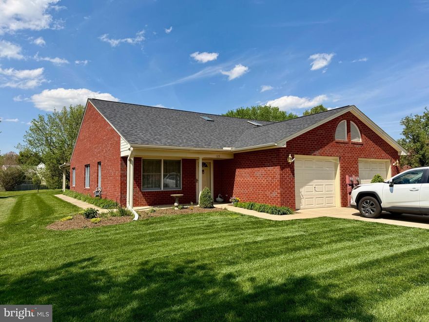 Beautifully maintained and updated brick semi-detached rancher! Level entry.  This pristine, one-owner home is truly move-in ready. The inviting open-concept floor plan features luxury vinyl flooring throughout the main living areas. The updated kitchen is a chef’s delight, boasting spanish stone countertops, a gas range with hood, a pantry, and ample cabinet space plus, all appliances convey! Retreat to the primary suite featuring a spacious walk-in closet and private full bath. A second bedroom and additional full hallway bath complete the main level. Enjoy outdoor living on the large covered patio overlooking a scenic community park. HOA fees include lawn care and snow removal for low-maintenance living. Perfectly located with quick access to I-70, I-81, shopping, dining, and schools.