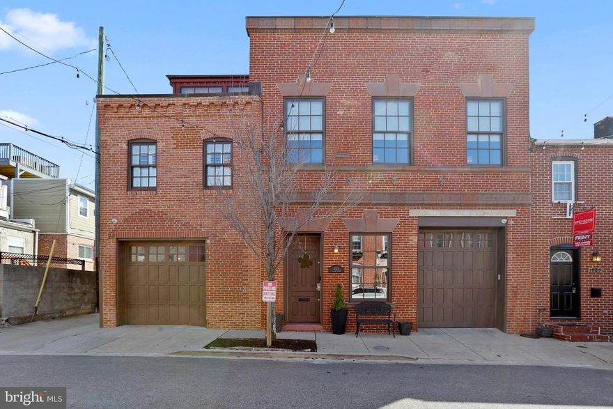 ONE OF A KIND 40 FT WIDE HISTORIC RESIDENCE STEPS AWAY FROM CANTON SQUARE. THE LIVING SPACE WAS DESIGNED WITH URBAN MODERN AND INDUSTRIAL FINISHES - PERFECT FOR ENTERTAINING. INCREDIBLE FRONT ENTRY GARAGE PARKING FOR UP TO 10 VEHICLES. 4 BEDROOMS WITH 2.5 BATHROOMS. STUNNING 2 STORY FOYER ENTRYWAY. ALARM SYSTEM WITH VIDEO SURVEILLANCE. GLISTENING OAK HARDWOODS CASCADE THROUGHOUT. ENJOY CUSTOM CABINETRY, UPGRADED TRIM, IMPORTED TILE, DESIGNER LIGHTING, CONCRETE COUNTERTOPS, DESIGNER CHEF'S GOURMET KITCHEN WHICH INCLUDES WOLF AND VIKING APPLIANCE PACKAGE. GIGANTIC FAMILY ROOM WITH 20 FT+ CEILINGS WITH GAS FIREPLACE. WALK-IN SHOWERS. WALK-IN CLOSETS. LOADS OF NATURAL LIGHT. INCREDIBLE OFFICE SPACE LOCATED ON SECOND LEVEL WITH CUSTOM BUILT INS AND VAULTED CEILINGS. WET BAR ON ROOF WITH BREATHTAKING WATER AND CITY SKYLINE VIEWS. CLOSE PROXIMITY TO RETAIL SHOPPING, LOCAL DINING, CANTON CROSSING, AND ALL MAJOR HIGHWAYS.